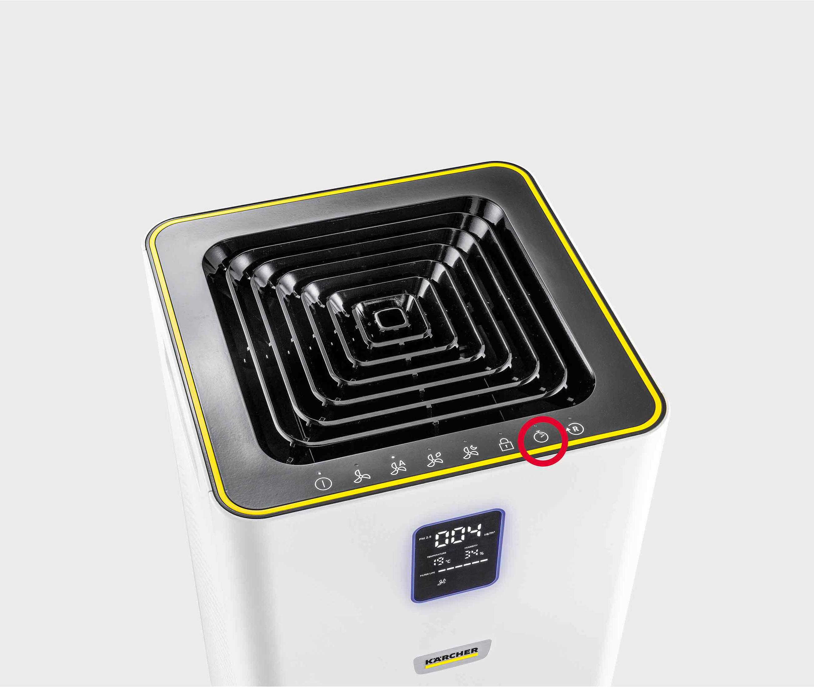 White air purifier with black top, yellow trim, and a power button highlighted in red.