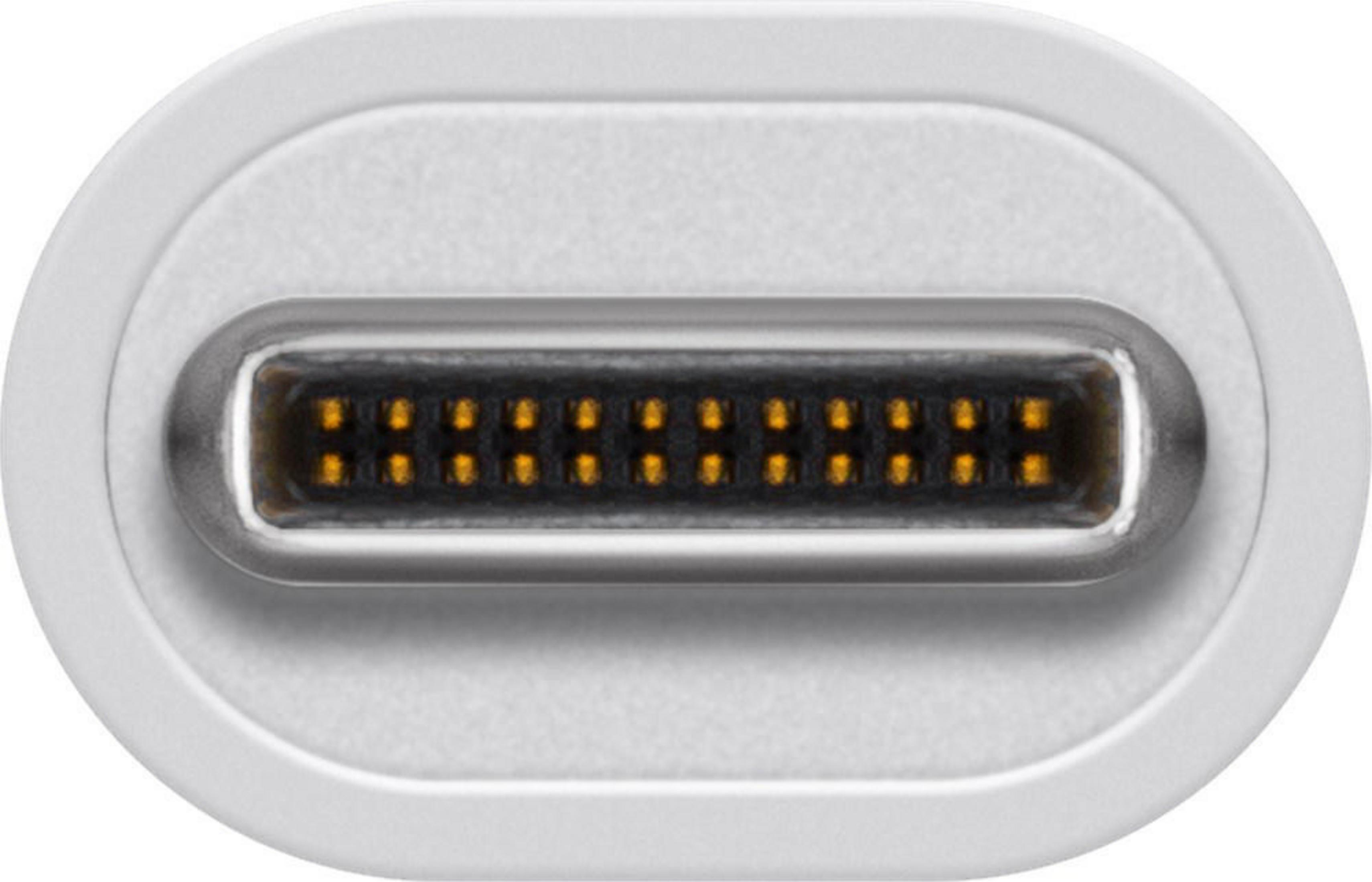 Zbliżenie białego złącza USB-C. Wewnątrz znajduje się wiele małych, złotych pinów.