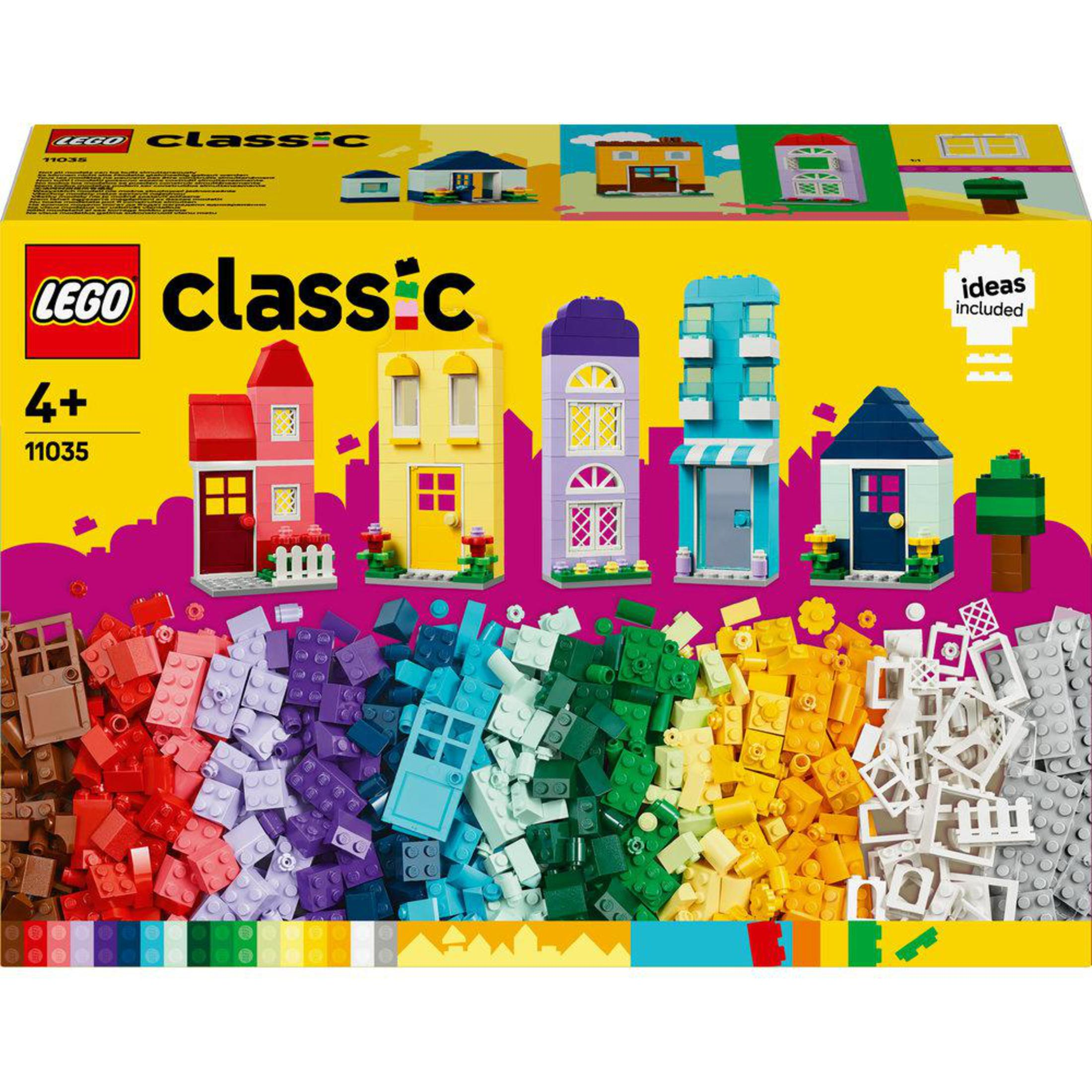 Una scatola Lego Classic con case Lego di diversi colori e mattoncini Lego.