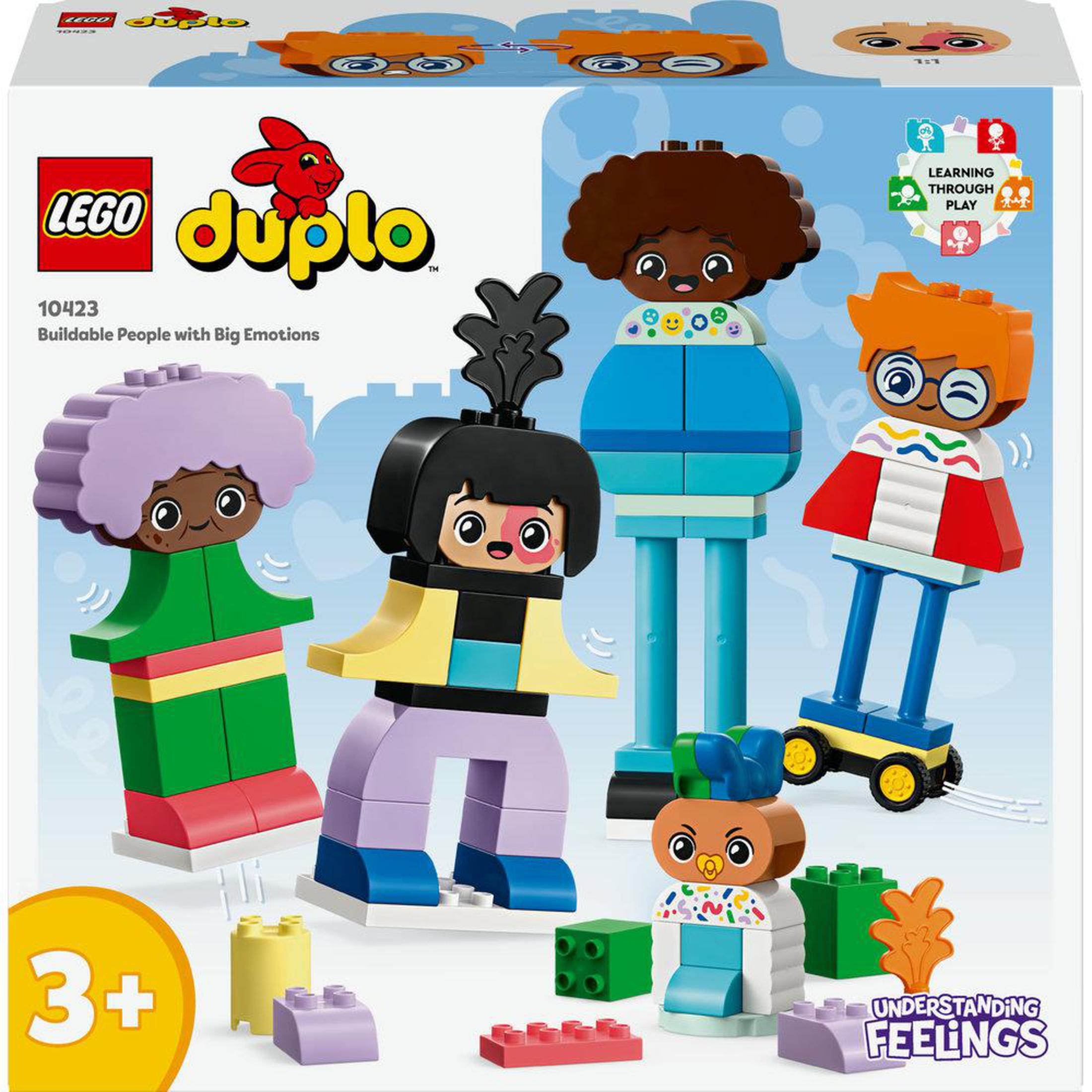 Pudełko Lego Duplo z czterema kolorowymi figurkami i klockami.