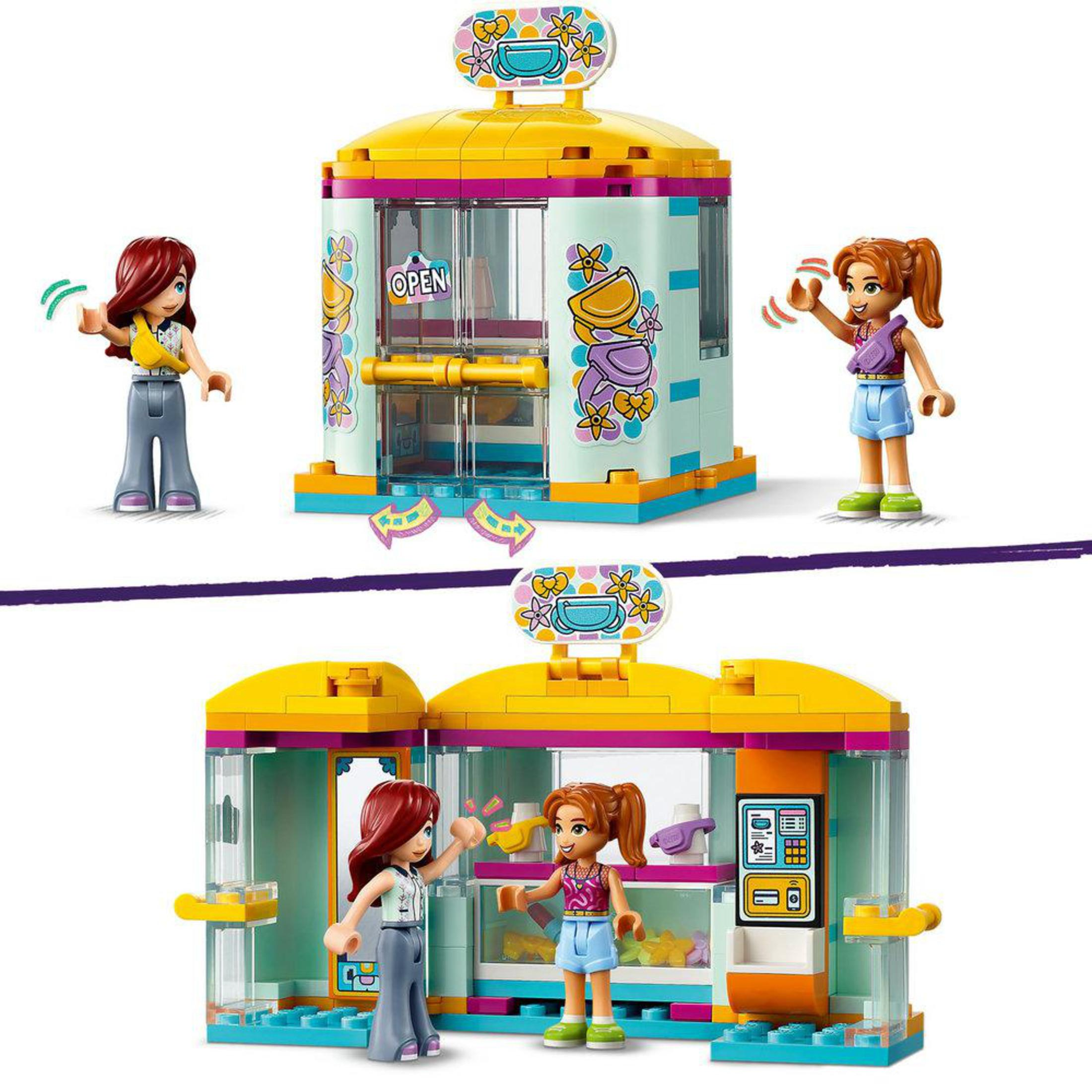 Zwei LEGO Friends Sets, die ein Geschäft zeigen. Zwei Figuren sind vorhanden. Die obere Hälfte zeigt das Äußere des Geschäfts. Die untere Hälfte zeigt das Innere.