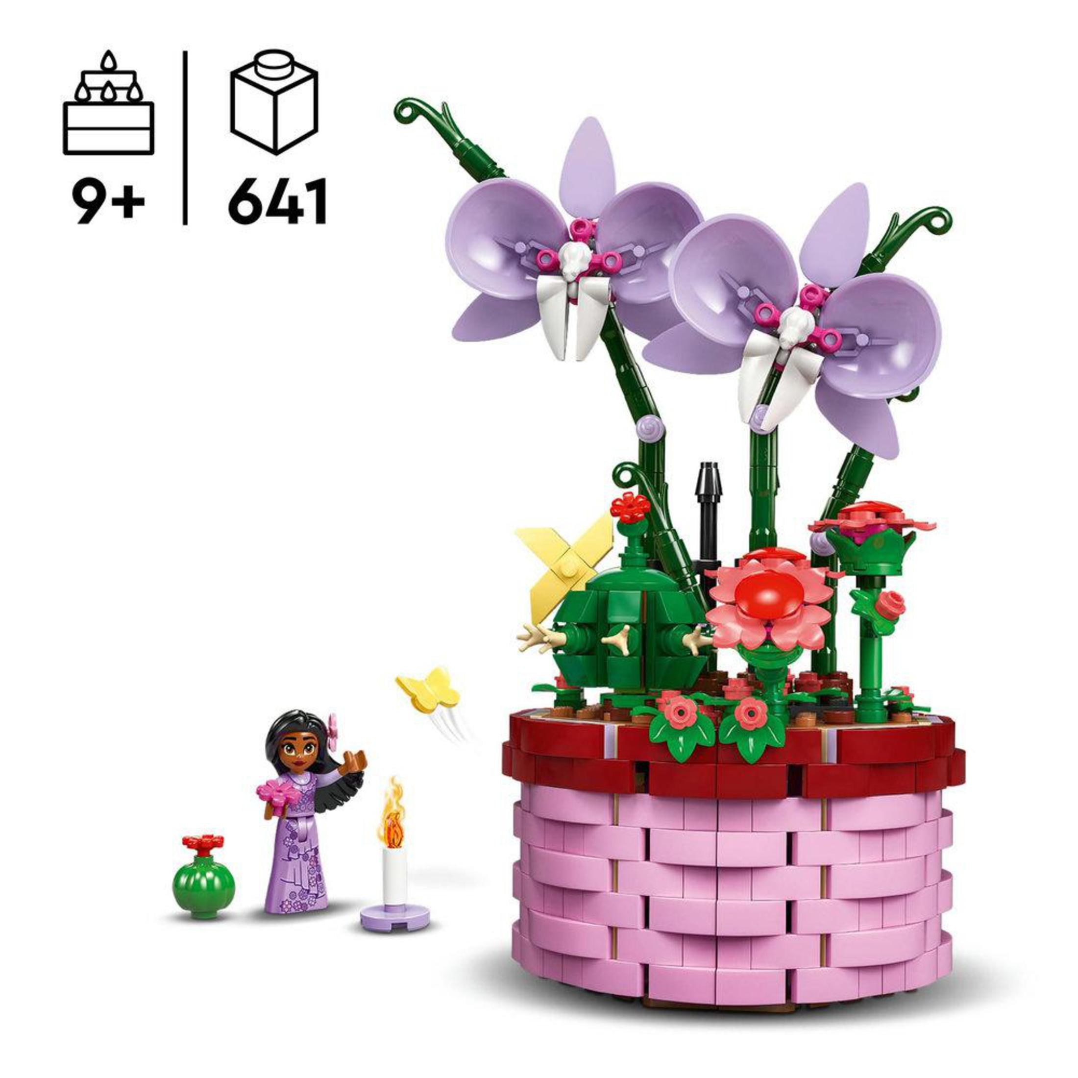 Set Lego con fiori, una bambina e una candela. Cestino rosa, piante verdi e farfalla gialla.