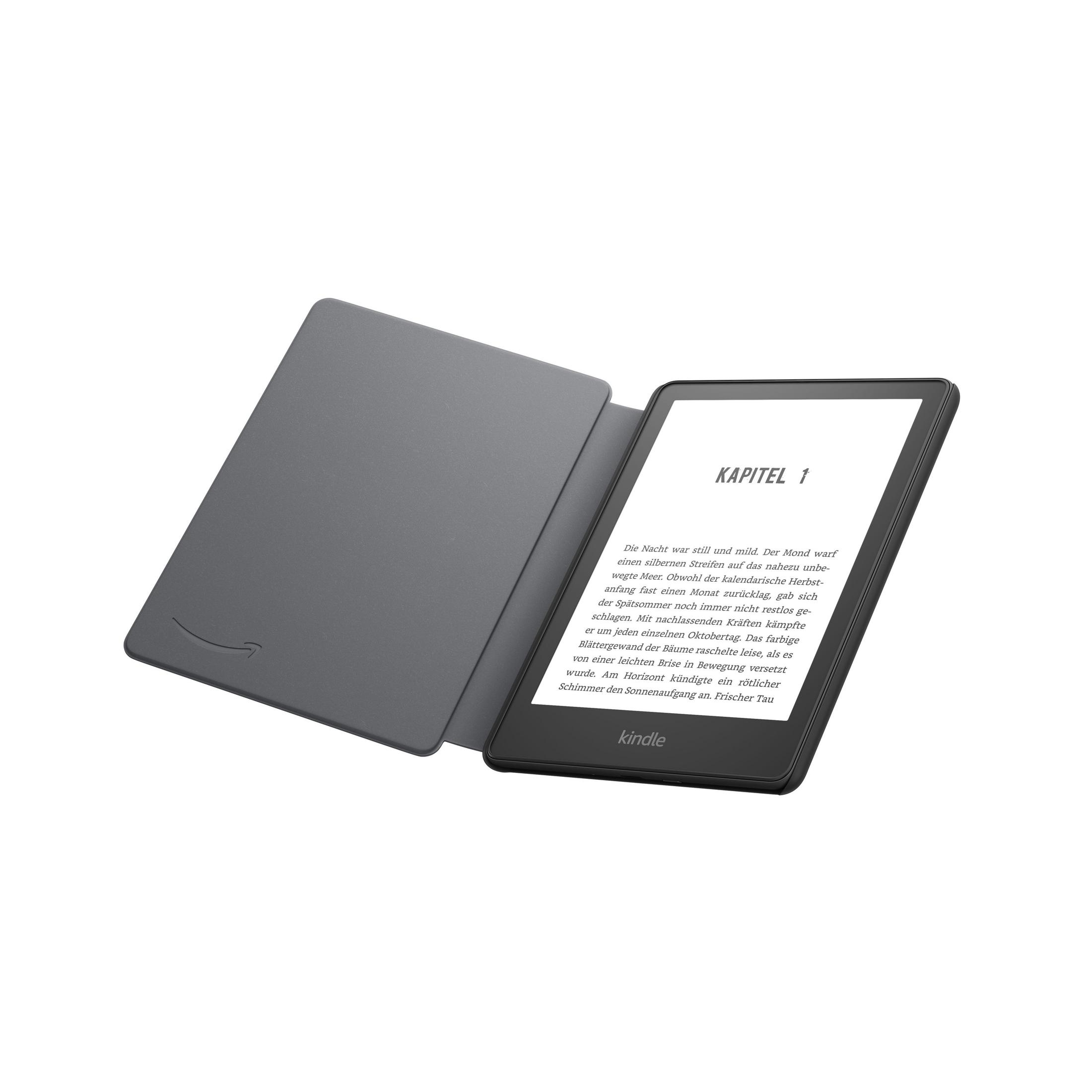Czytnik Kindle z otwartą okładką, wyświetlający tekst z książki.
