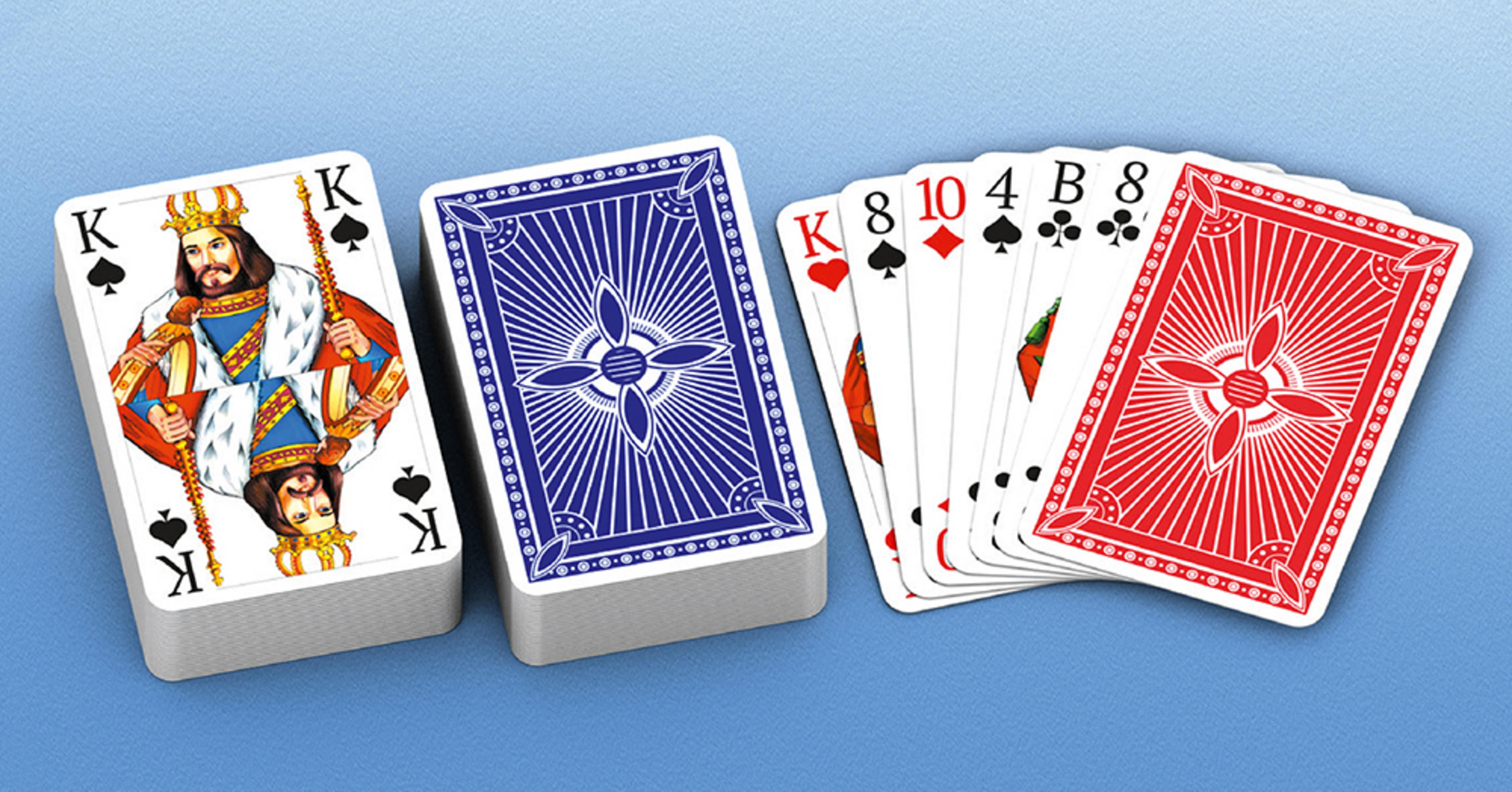 Cartes à jouer: Roi de pique en haut, jeu de cartes à dos bleu, cartes étalées montrant Roi, 8, 10.