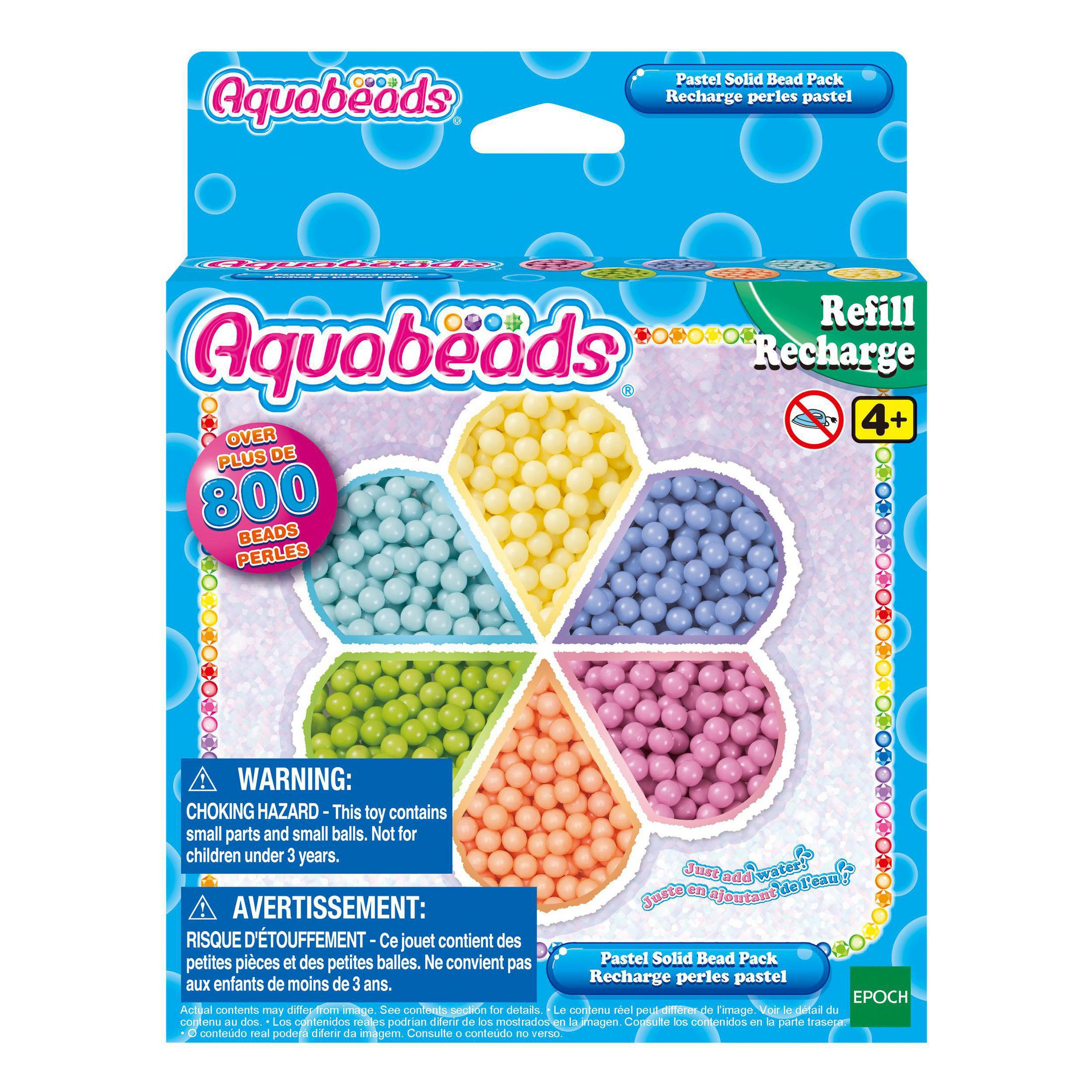 Scatola di Aquabeads con sei colori. Etichetta di avvertimento. Contiene piccole parti. Non -3 anni.