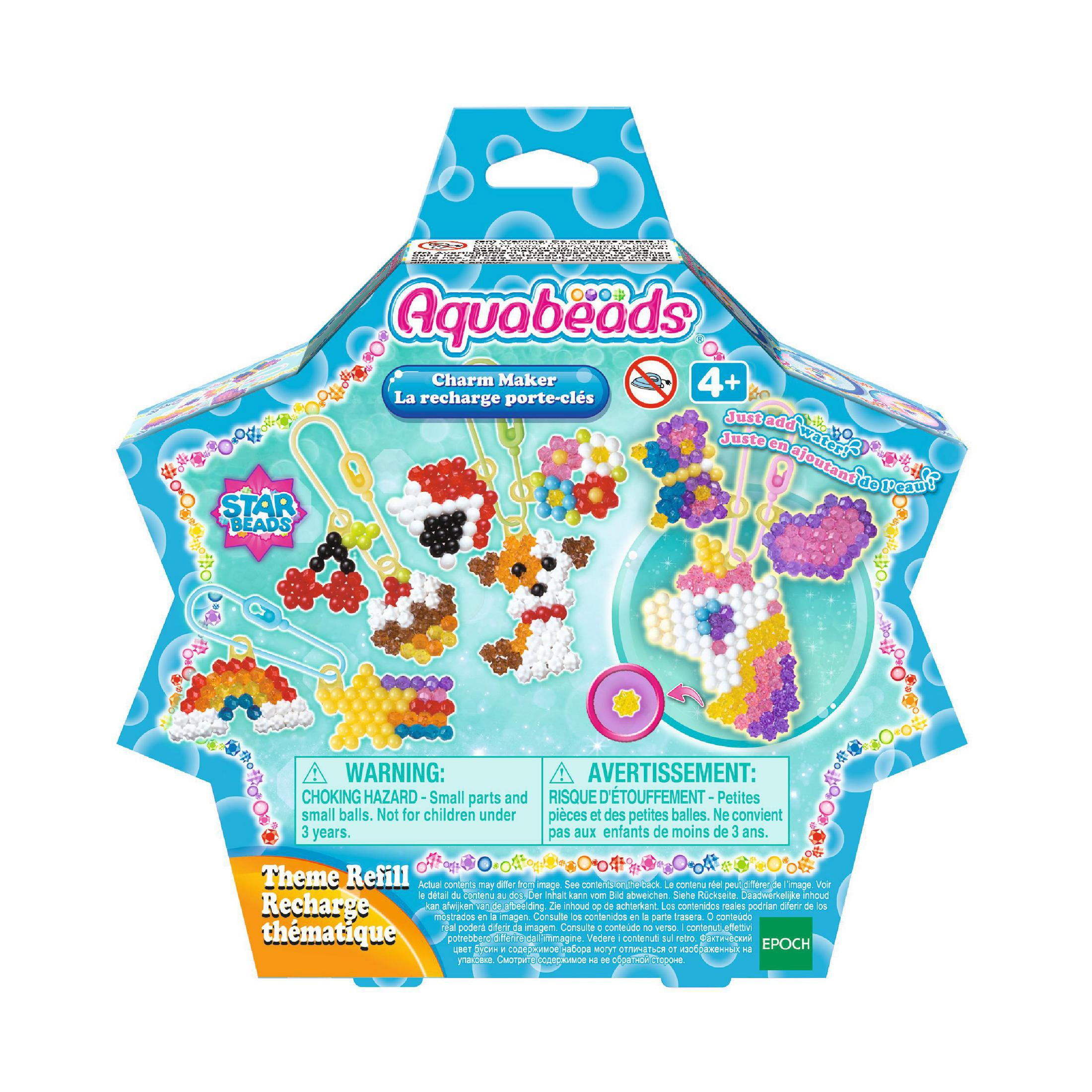 Aquabeads-Box. Perlen und fertige Charms. Bunte Designs. Warnhinweise.