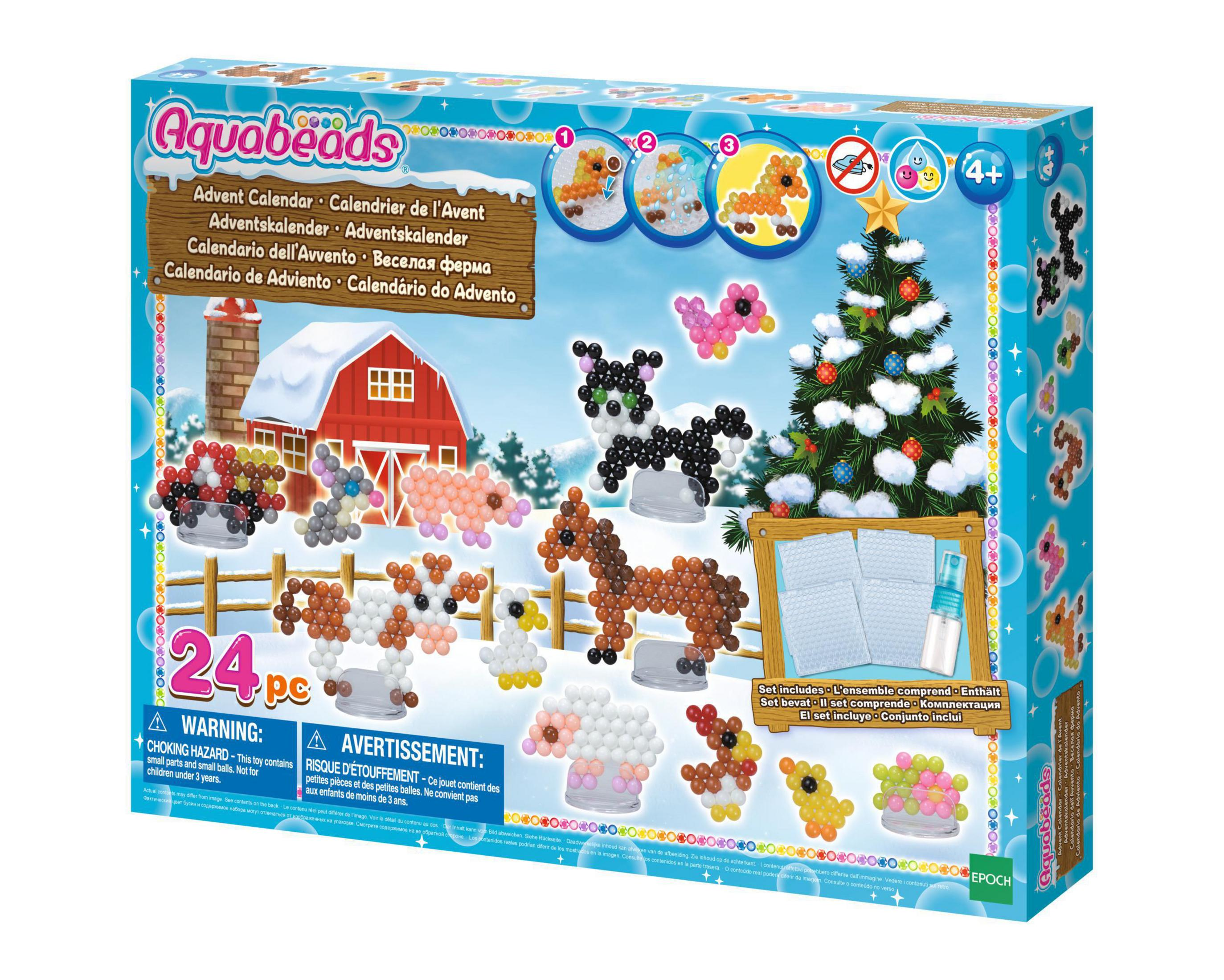 Eine Box mit einer Weihnachtsszene. Sie zeigt einen Weihnachtsbaum, Tiere und die Worte 'Adventskalender'.
