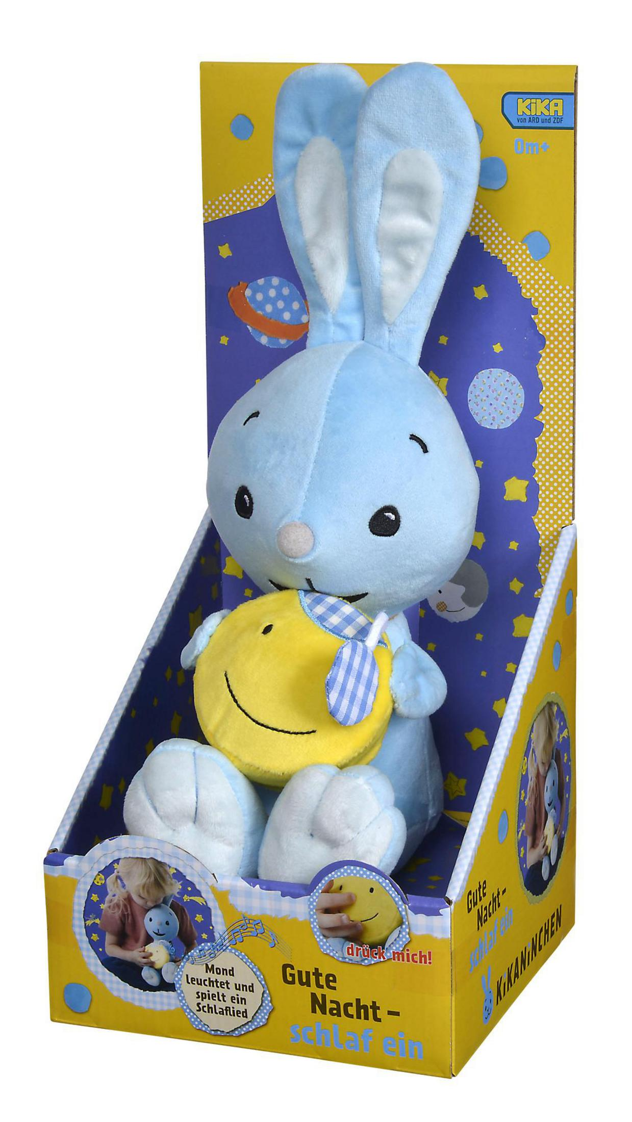 Ein blau-weißes Hasenspielzeug in einer Box mit einem gelben Smiley-Spielzeug und einem Buch.