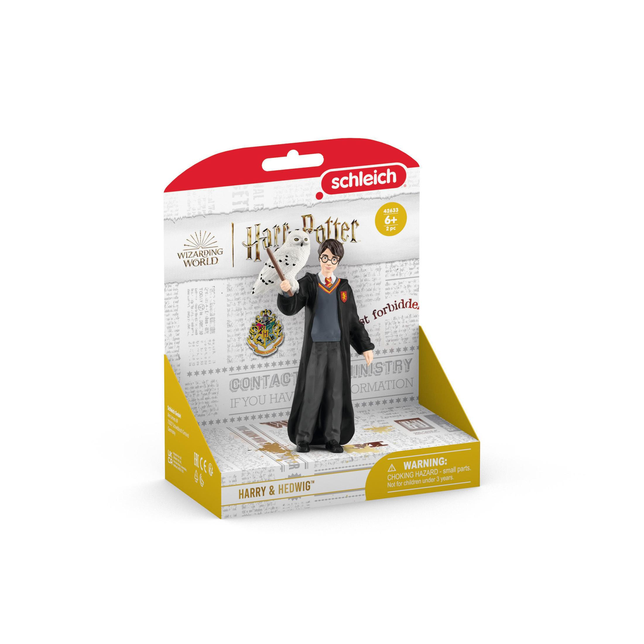 Figura di Harry Potter con gufo in scatola espositiva con testo.