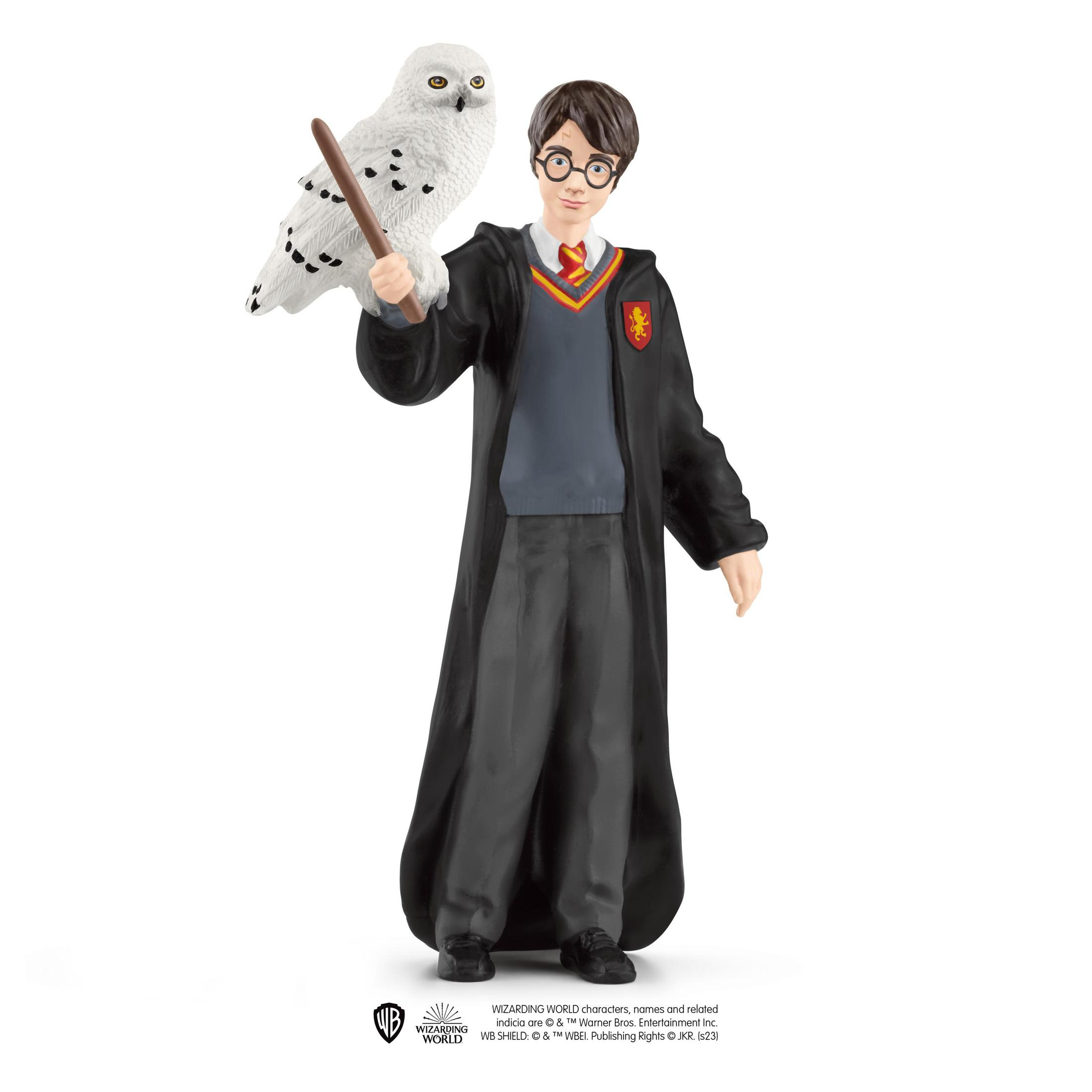 Figura di Harry Potter con gufo e bacchetta.