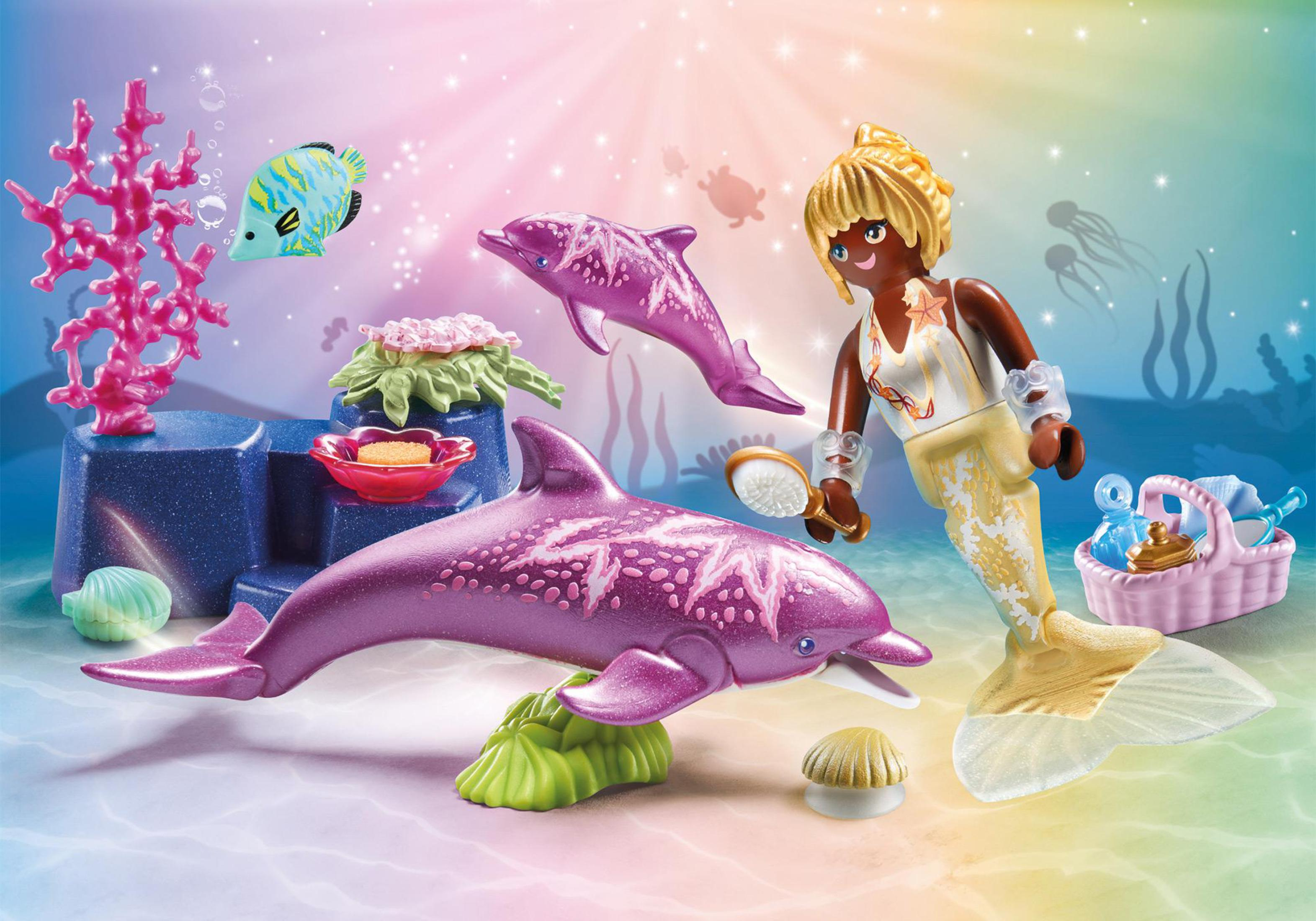 Playmobil-Set einer Meerjungfrau, Delfinen und Unterwasserelementen. Bunt und lebendig.