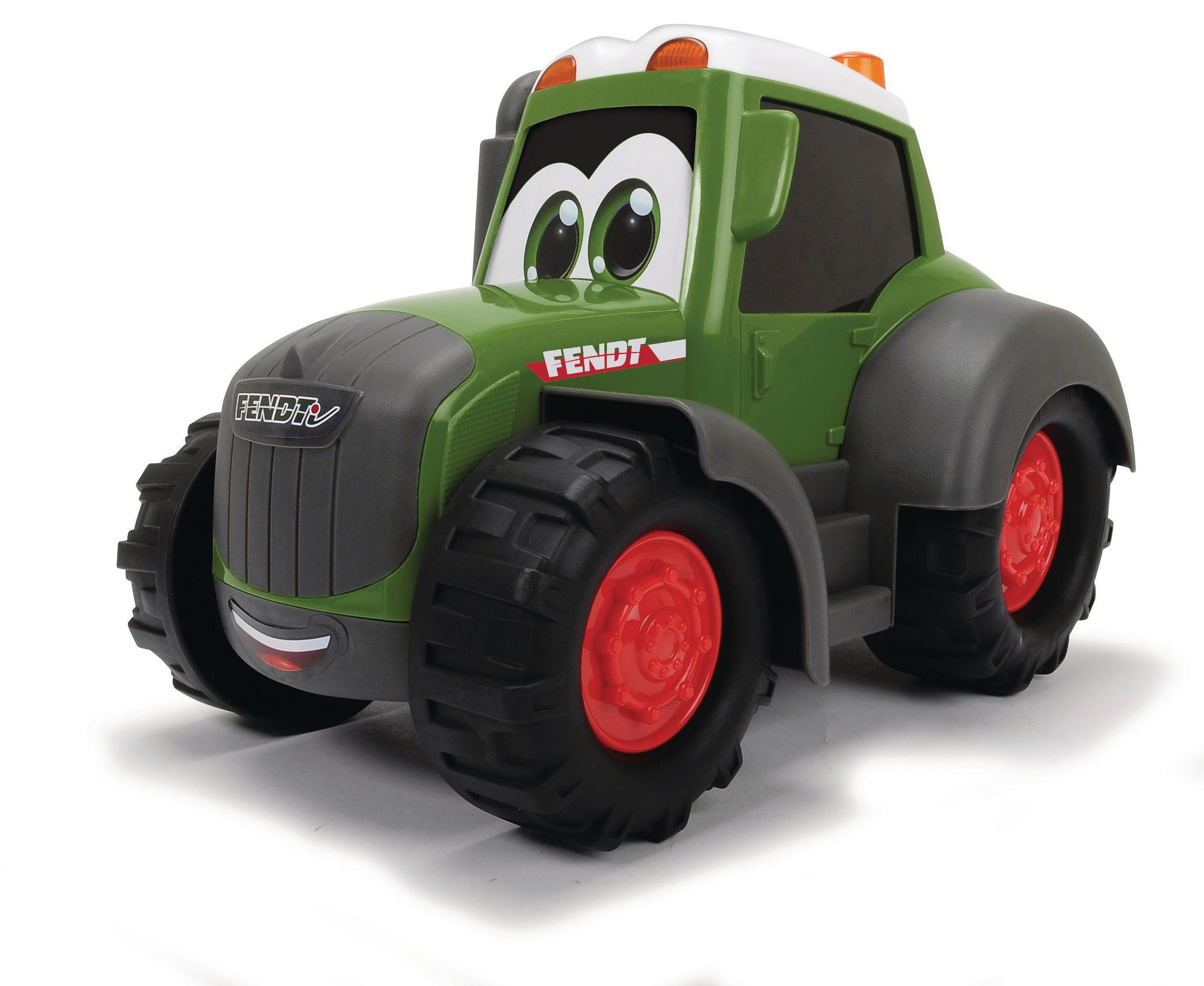 Ein grüner Spielzeugtraktor mit einem lächelnden Gesicht. Der Traktor hat rote Räder und das Wort Fendt darauf.