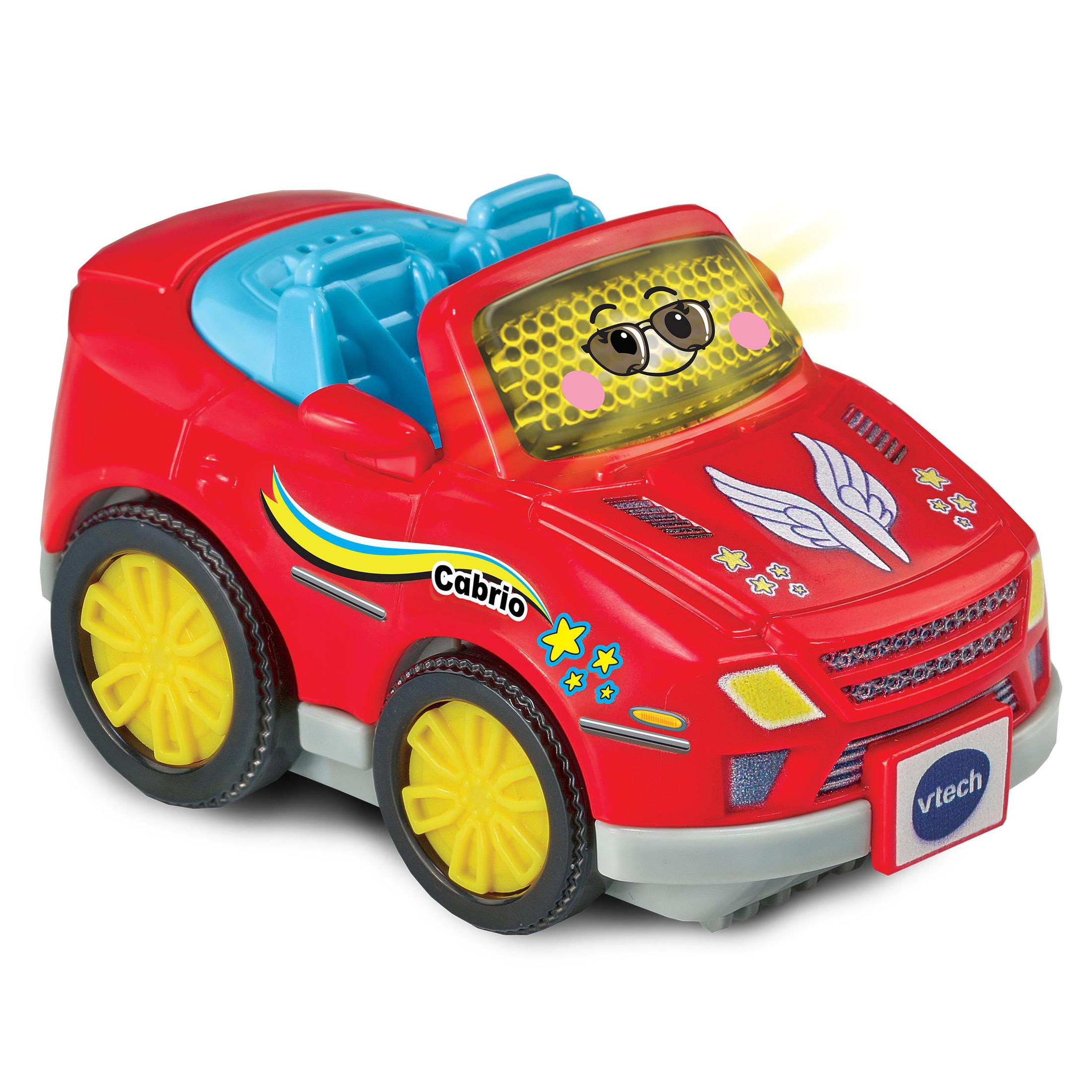Roter Spielzeug-Cabrio mit gelben Rädern und einem lächelnden Gesicht auf der Windschutzscheibe.