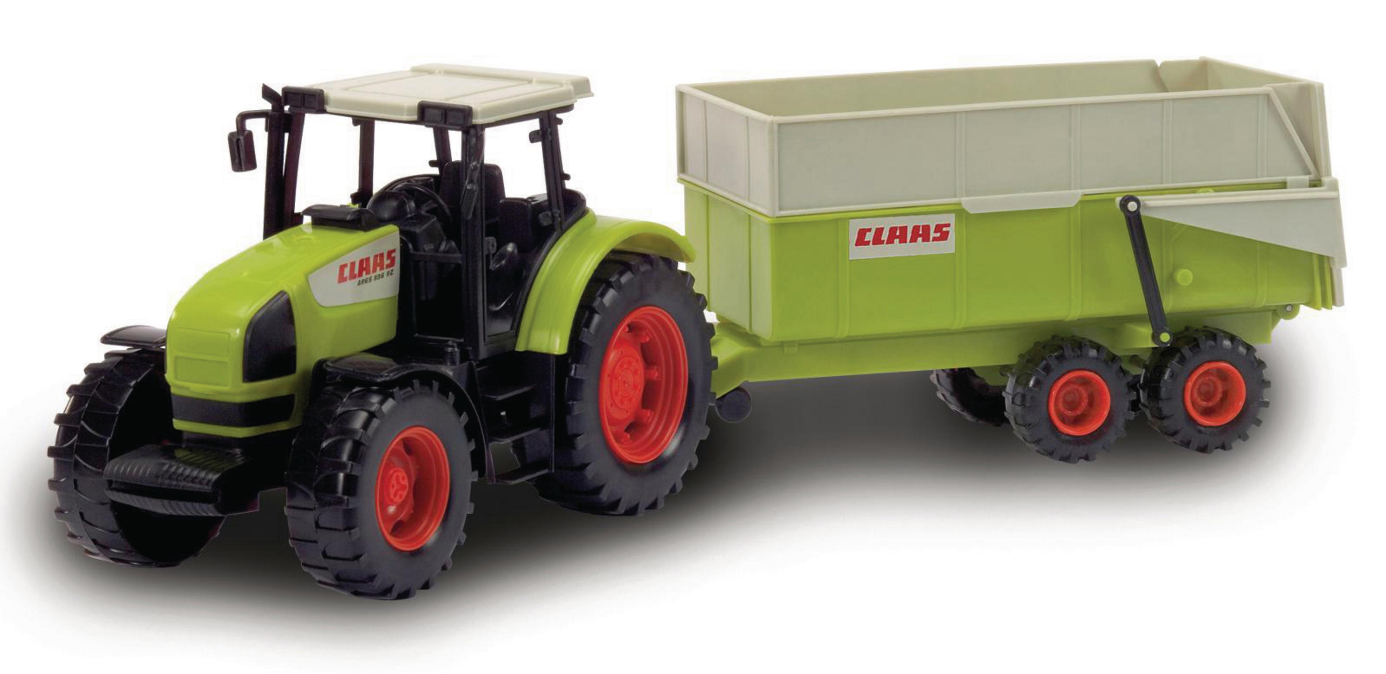 Zielony traktor z przyczepą, model zabawkowy na białym tle.