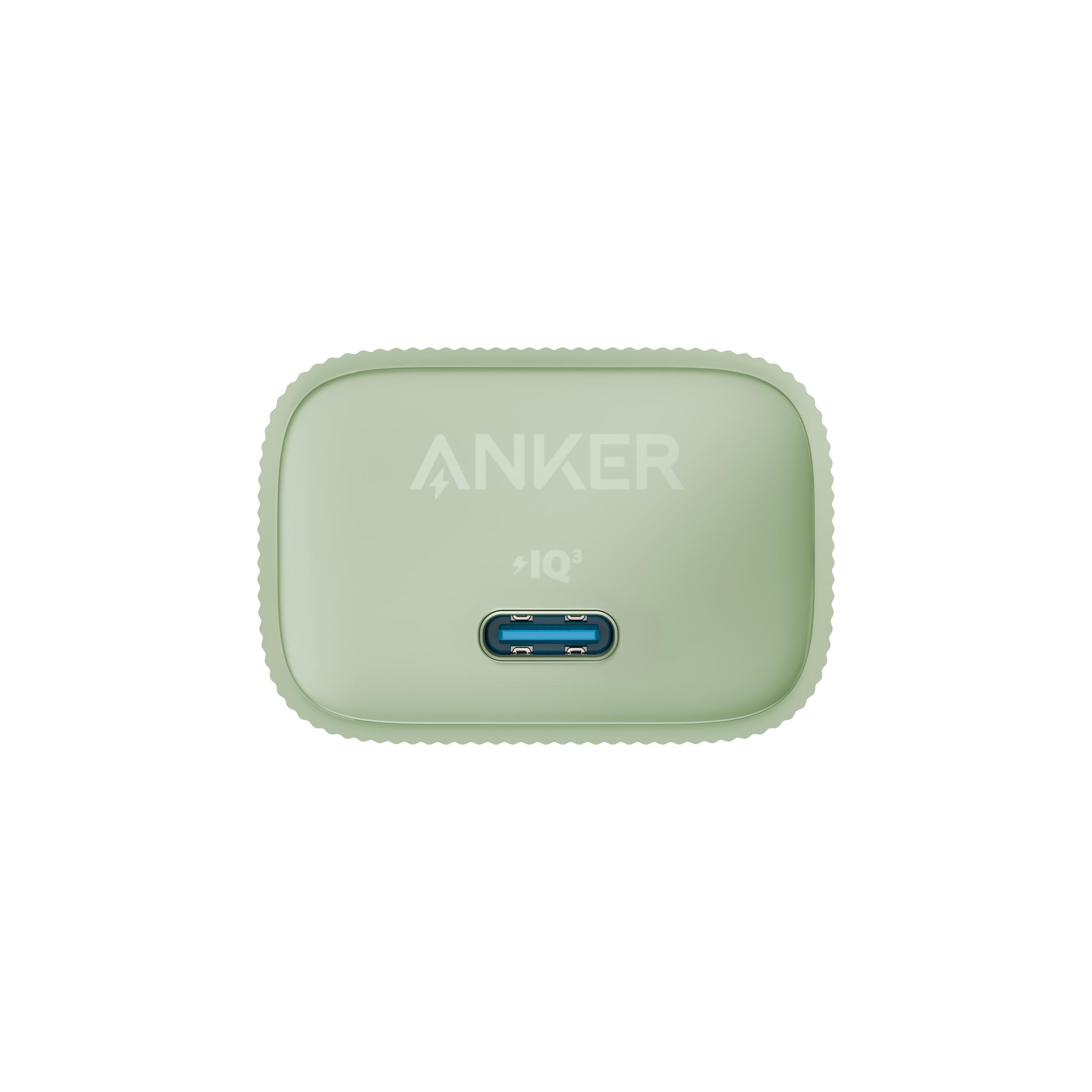 Grünes Anker-Ladegerät mit USB-Anschluss und Anker-Logo.