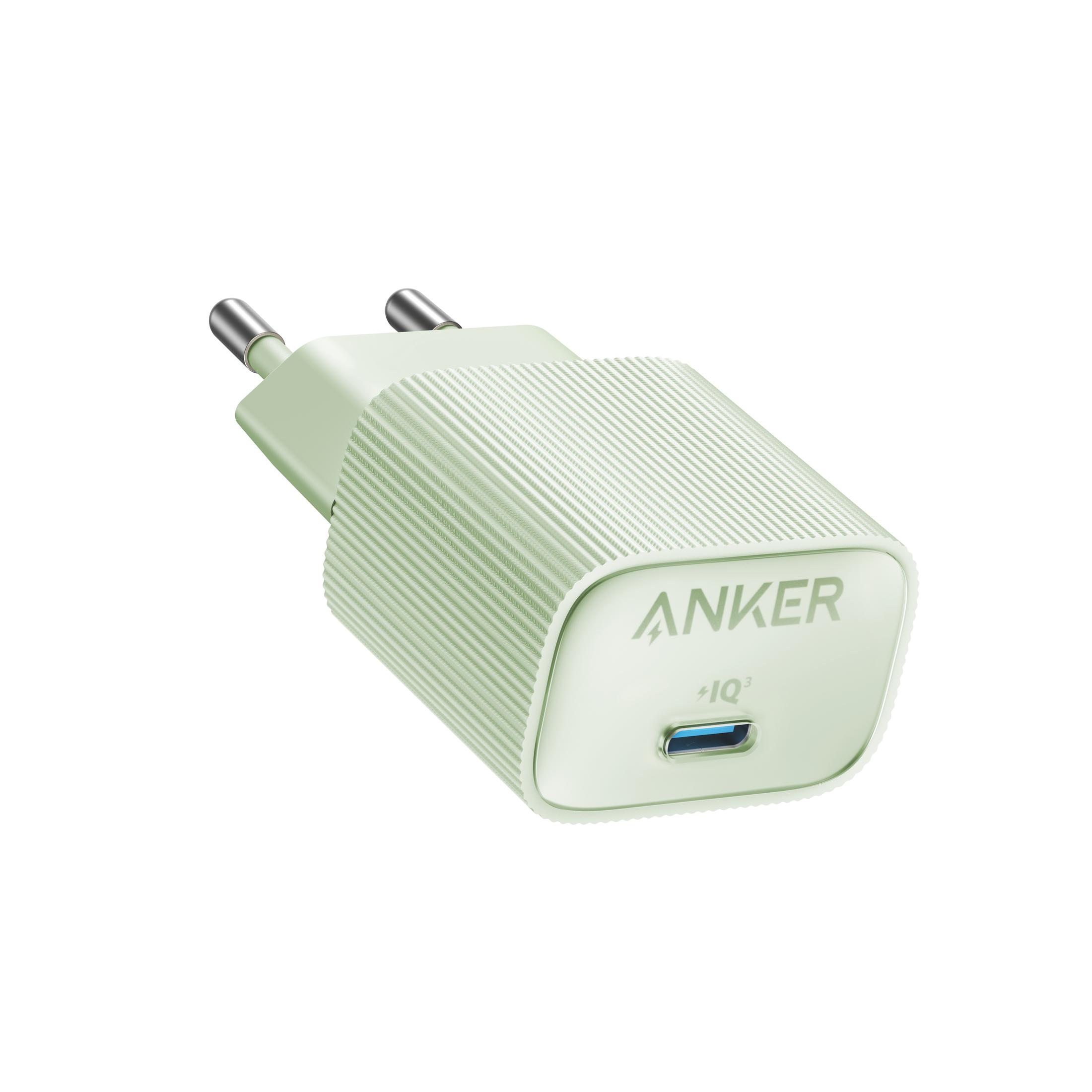 Hellgrünes Anker-Ladegerät mit Stiften und USB-Anschluss.