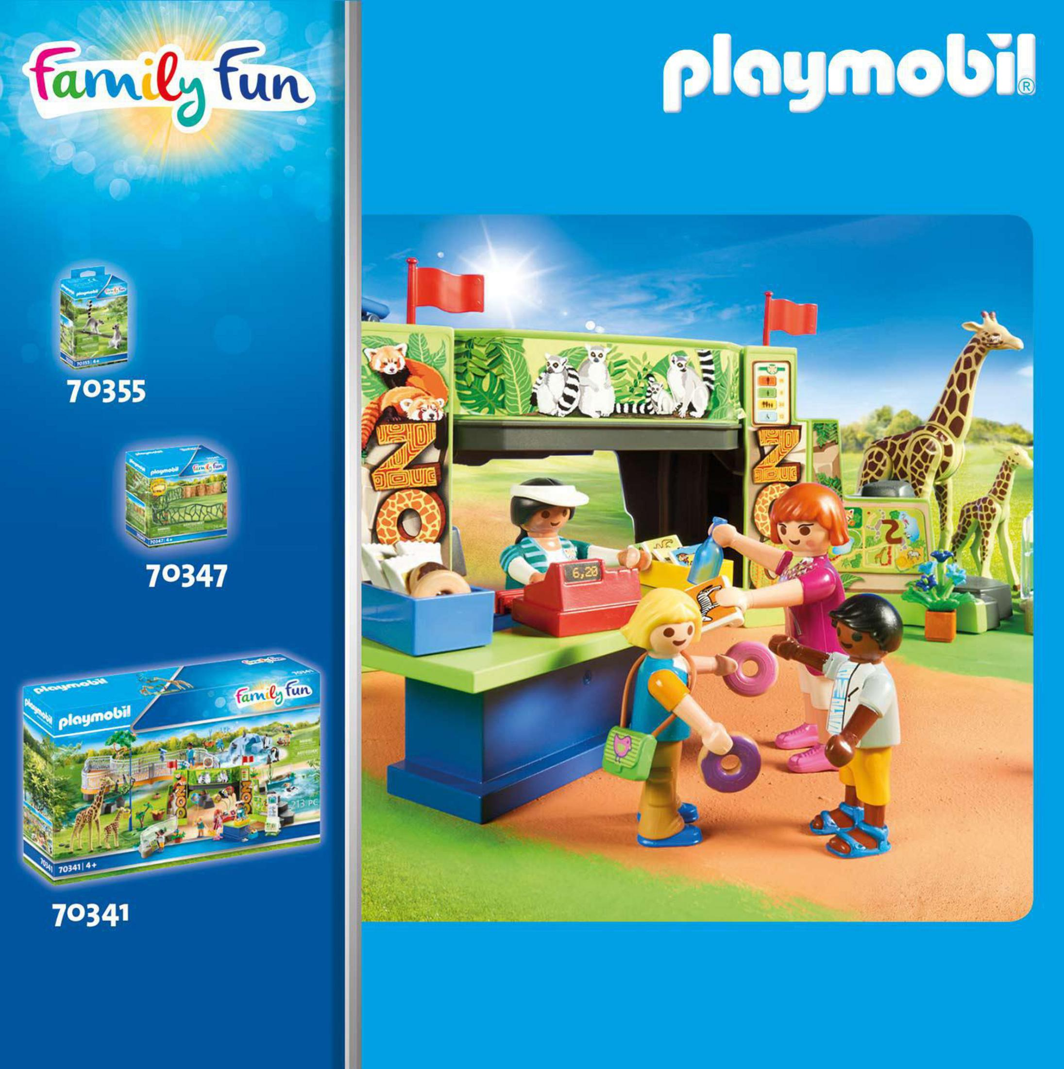 Scena zoo Playmobil z figurkami i pudełkami ze zwierzętami, kasjerem i klientami.