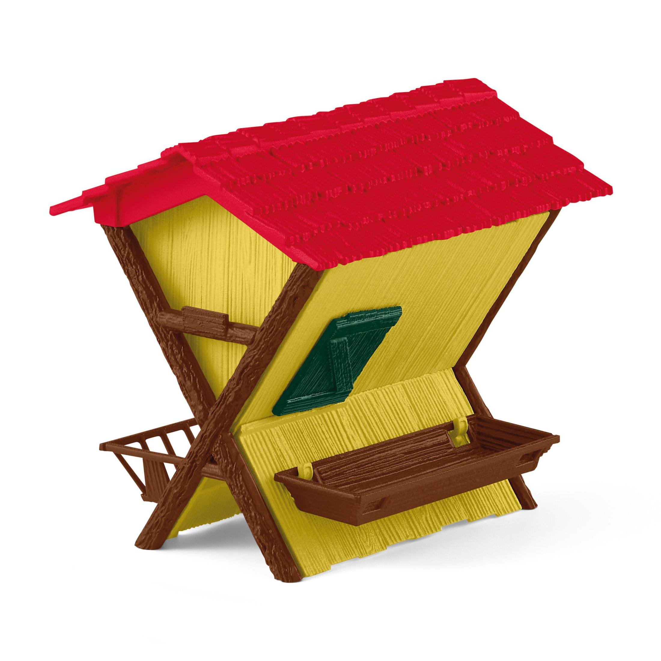 Ein gelbes und rotes Spielzeug-Vogelhaus mit einem braunen Tablett.