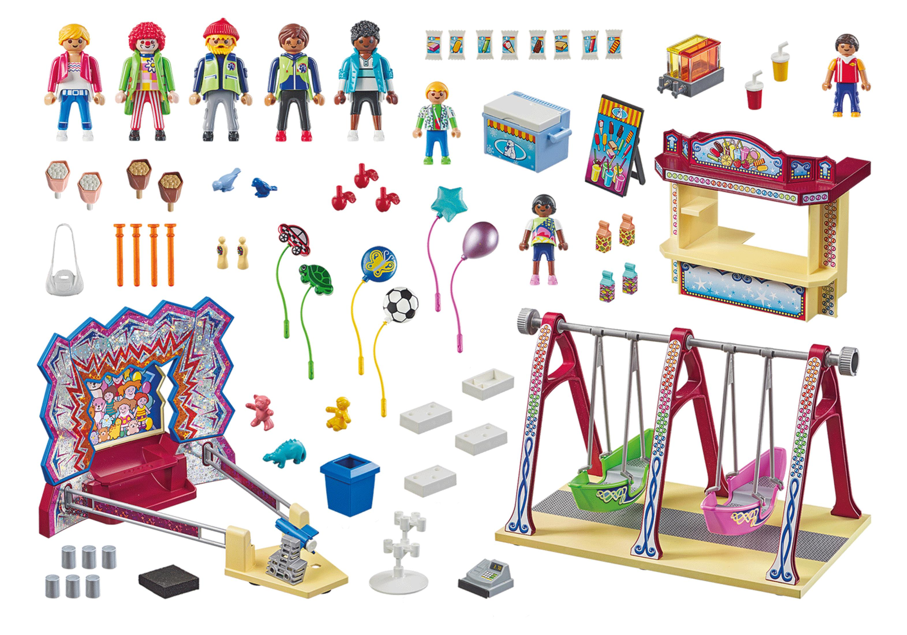 Set de carnaval Playmobil con figuras, juegos y un columpio. Múltiples accesorios y fondo blanco.