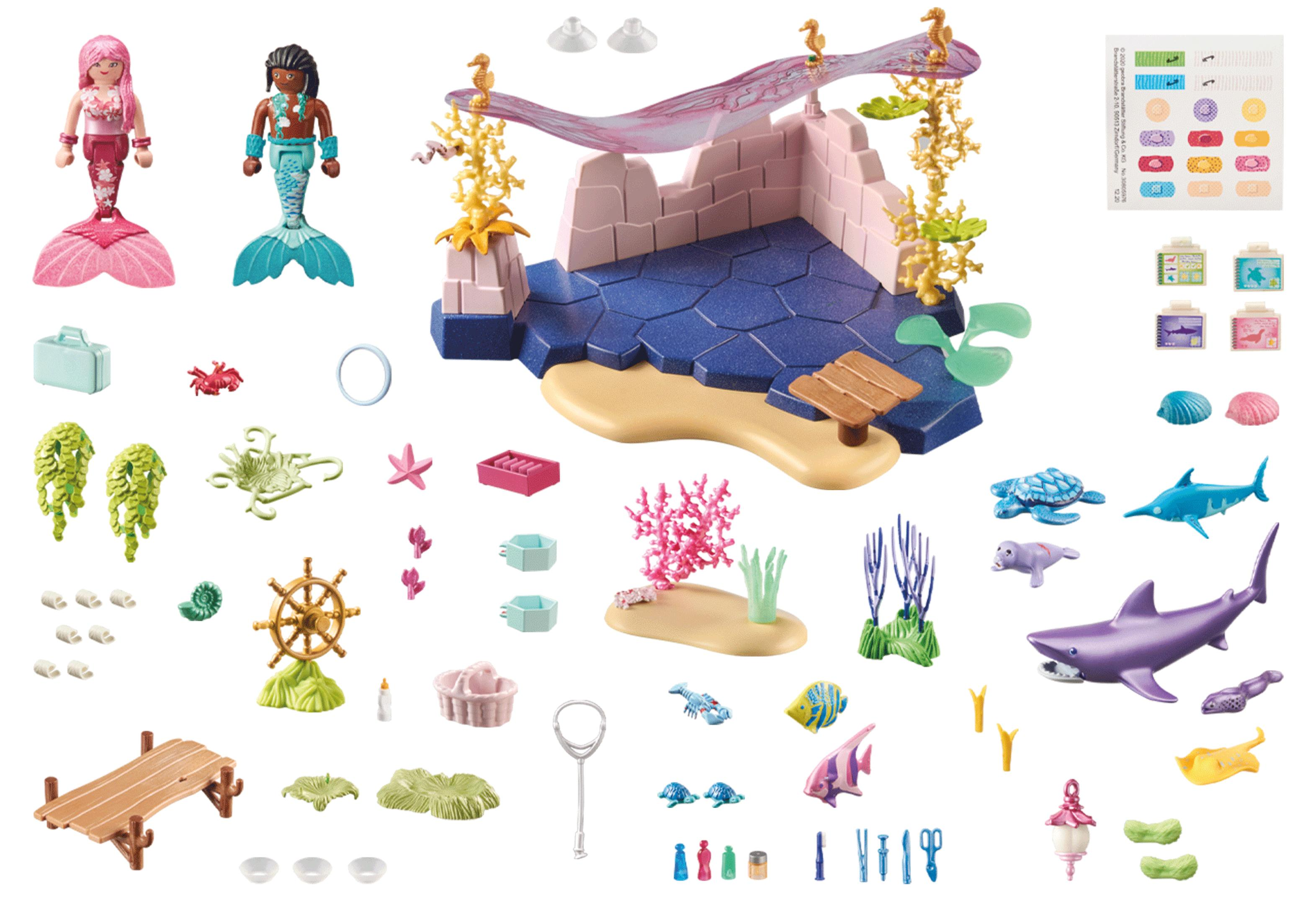 Set Playmobil con sirene, creature marine e accessori, in un ambiente acquatico.