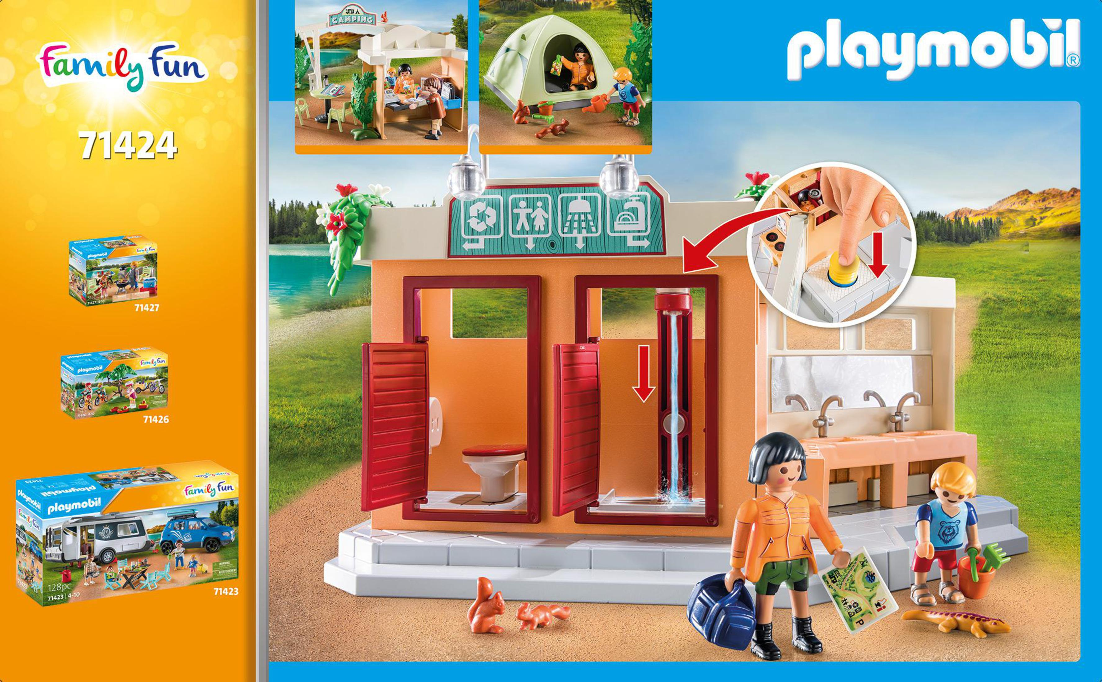 Un set da campeggio Playmobil con personaggi e un edificio con servizi igienici e doccia.