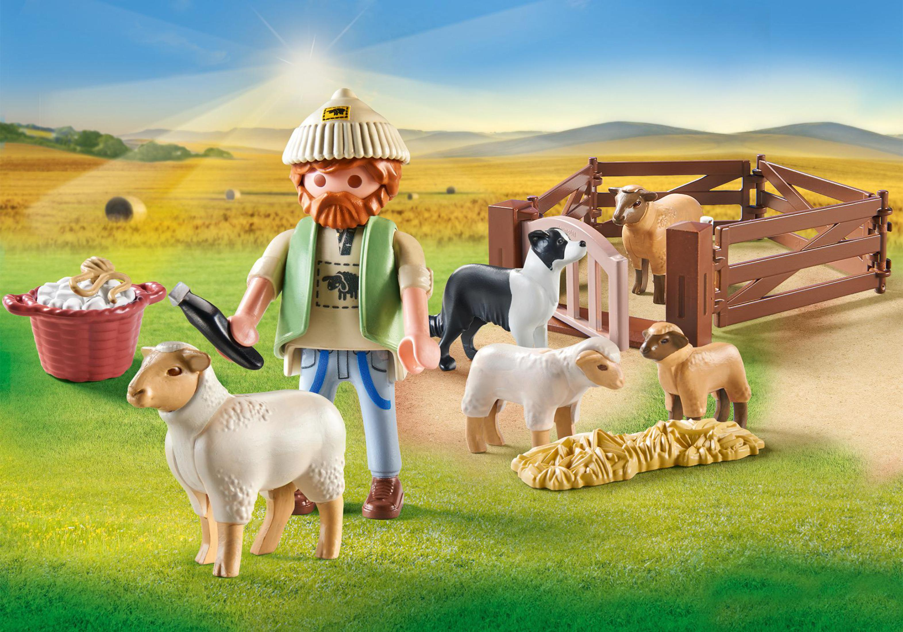 Playmobil-Szene mit Schäfer, Schafen, Hund und Bauernhof.
