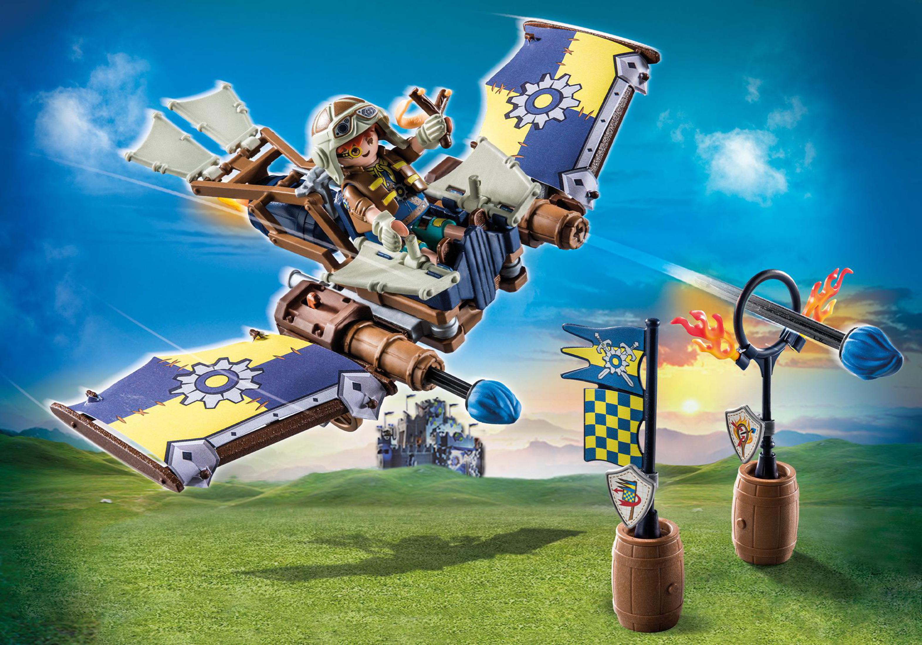 Ein Spielzeugflugzeug mit Pilot und Zielen am blauen Himmel.
