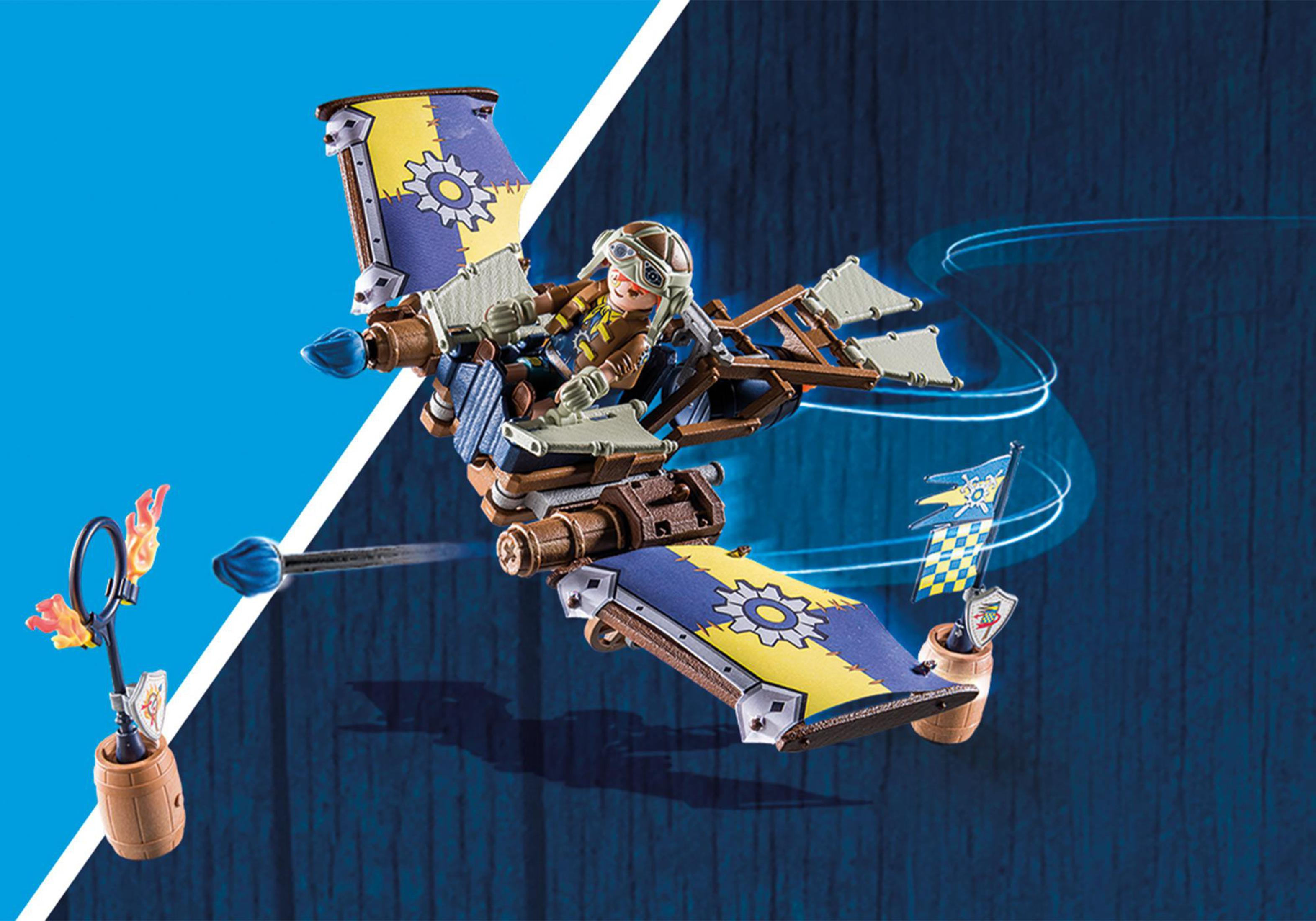 Spielzeugflugzeug mit einer Pilotenfigur. Es ist gelb, blau und braun. Es gibt ein Fass und Flammen.