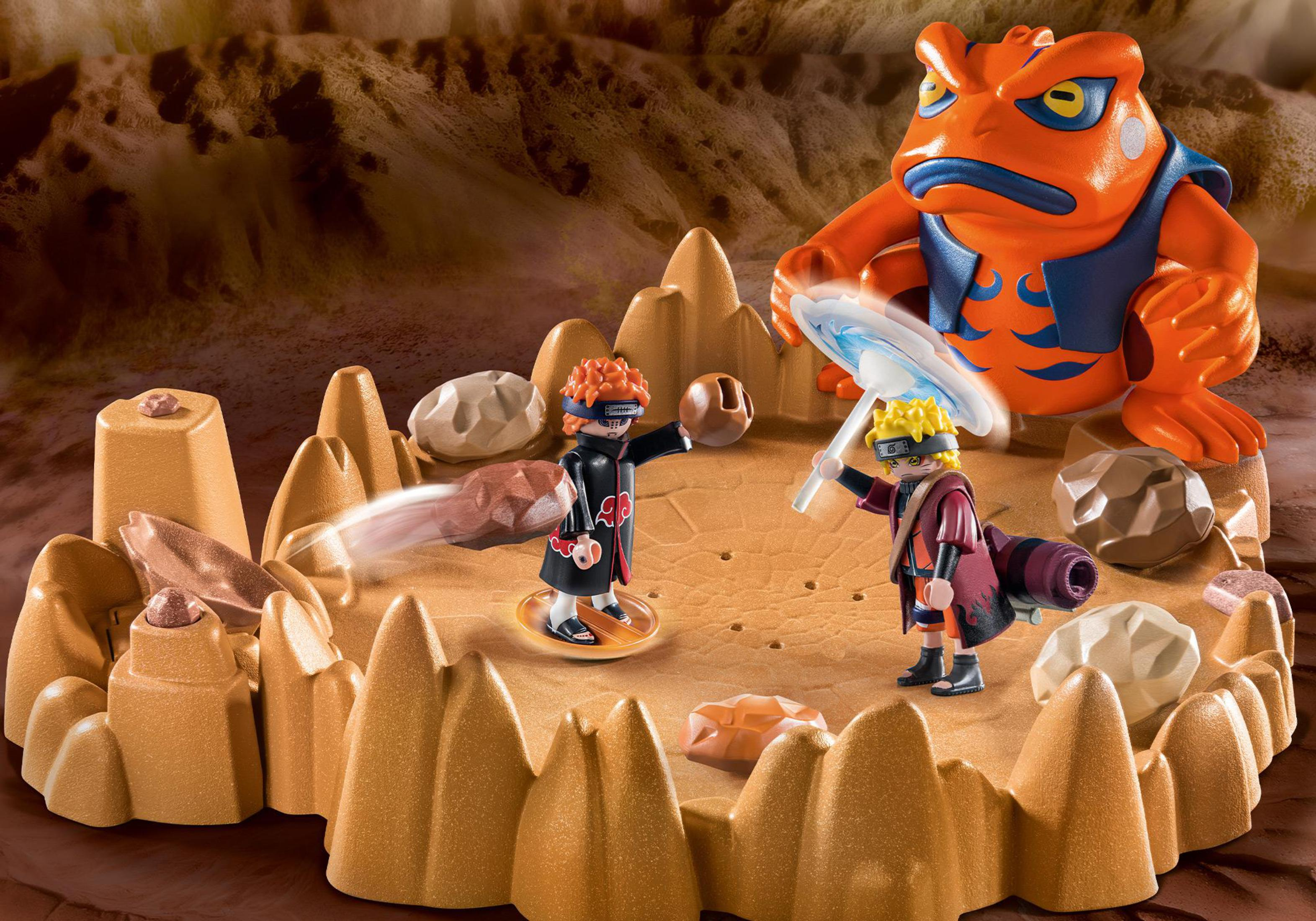 Playmobil Naruto-Set. Zwei Figuren kämpfen in einer felsigen, sandigen Umgebung.