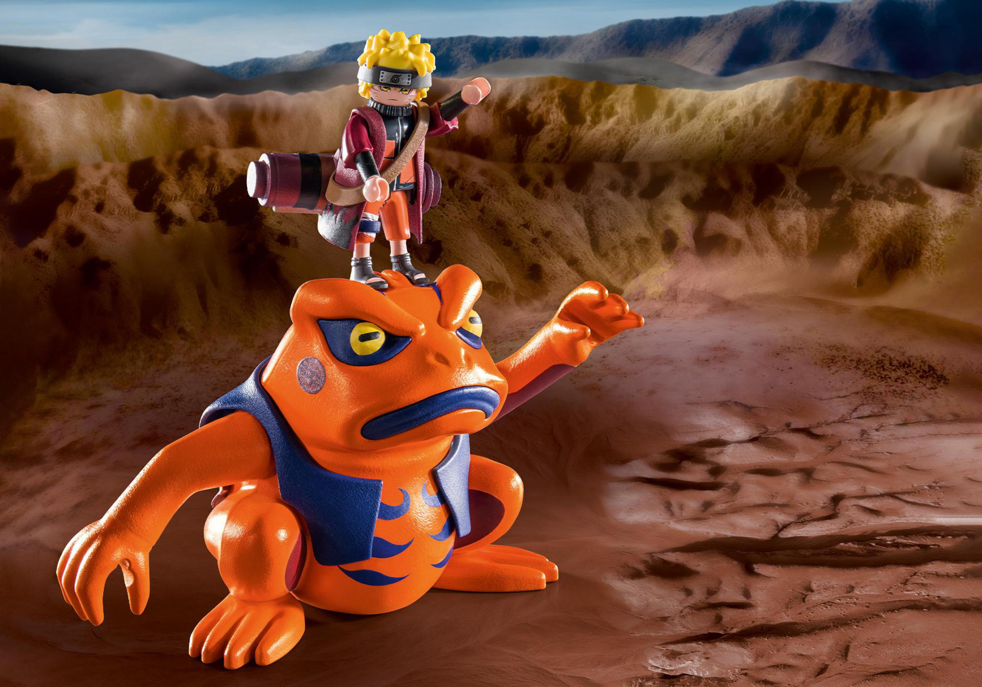 Eine Naruto-Figur auf einem riesigen orangefarbenen Frosch mit Bergkulisse.