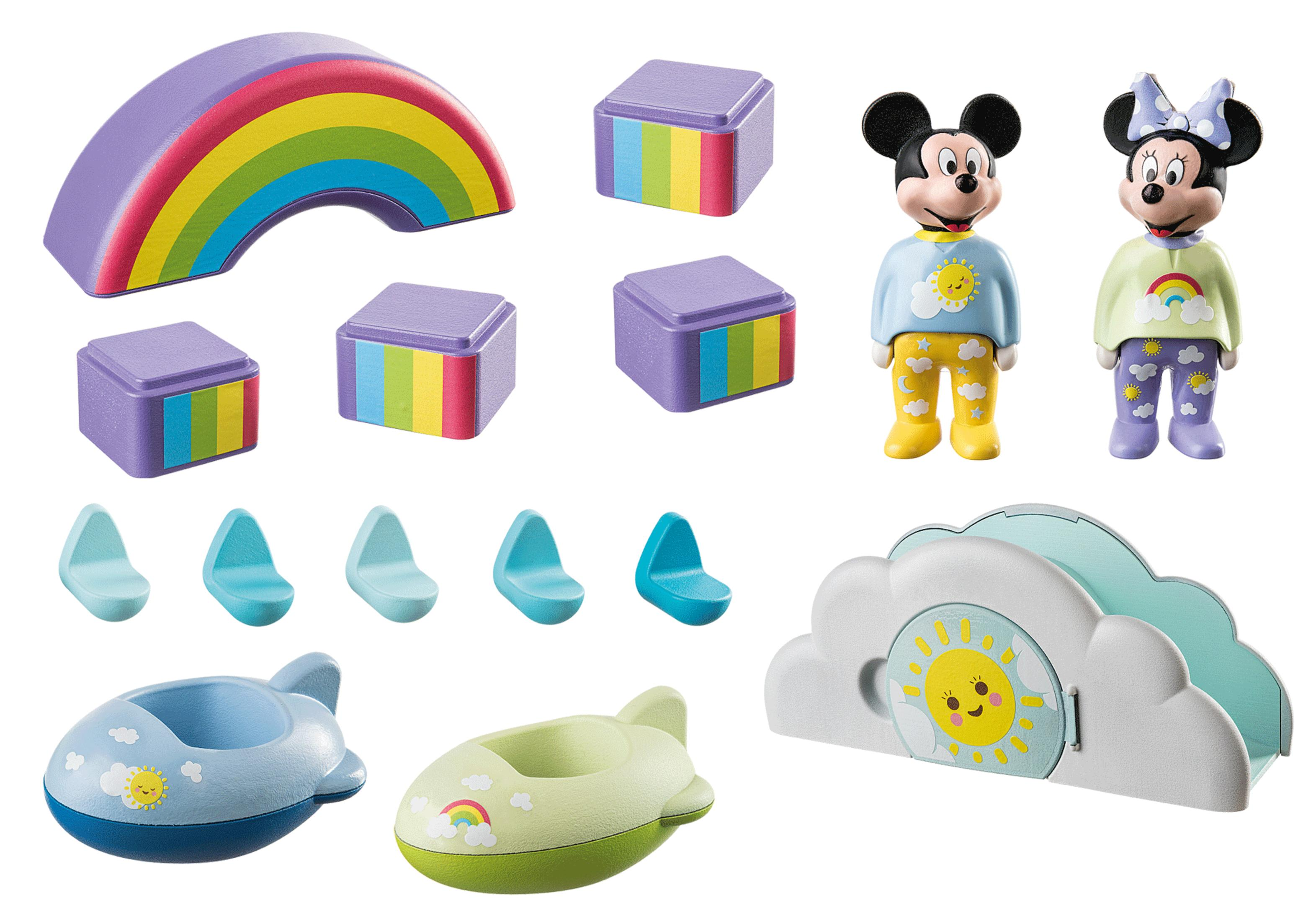 Juego de juguetes con un arcoíris, bloques, figuras de Mickey y Minnie Mouse y orinales en forma de avión.