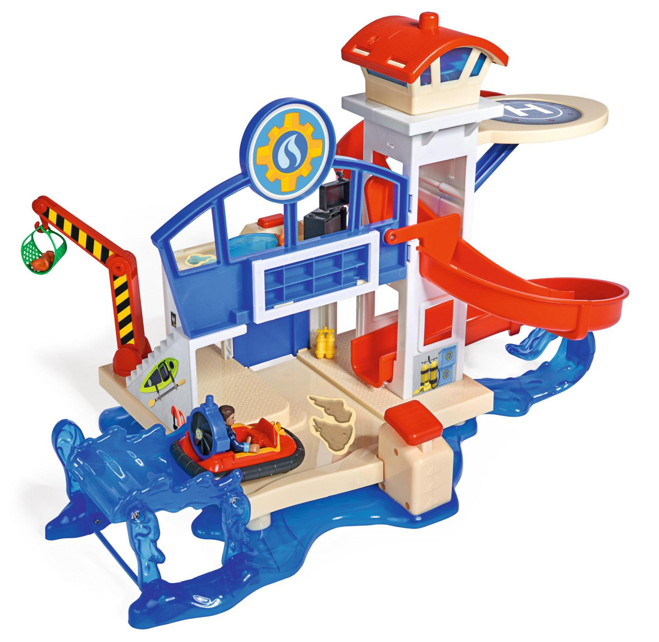 Eine Spielzeug-Wasserrettungsstation mit Boot, Rutsche und Landeplatz.