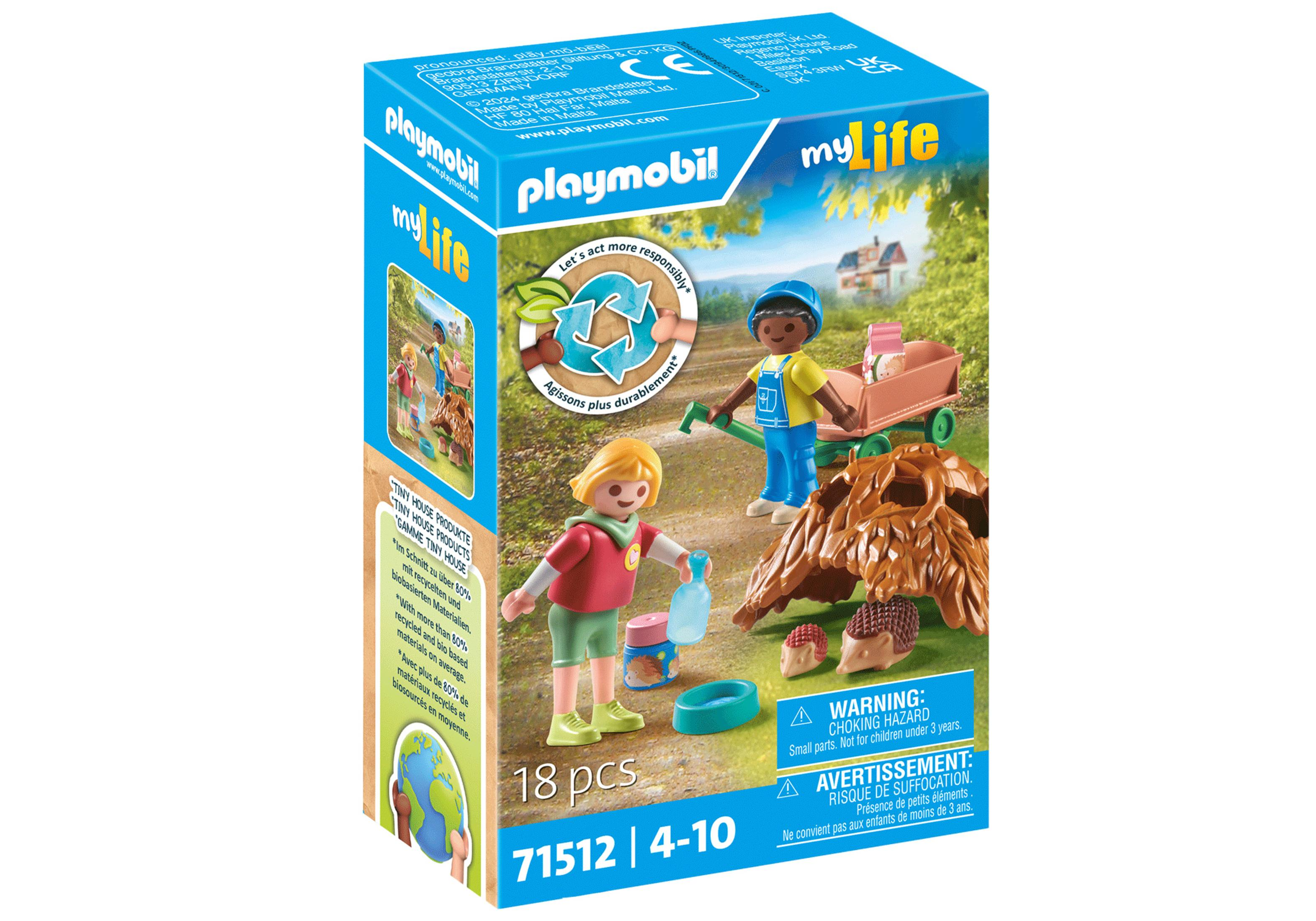 Set Playmobil: figure vicino a un albero, con un annaffiatoio e una carriola.