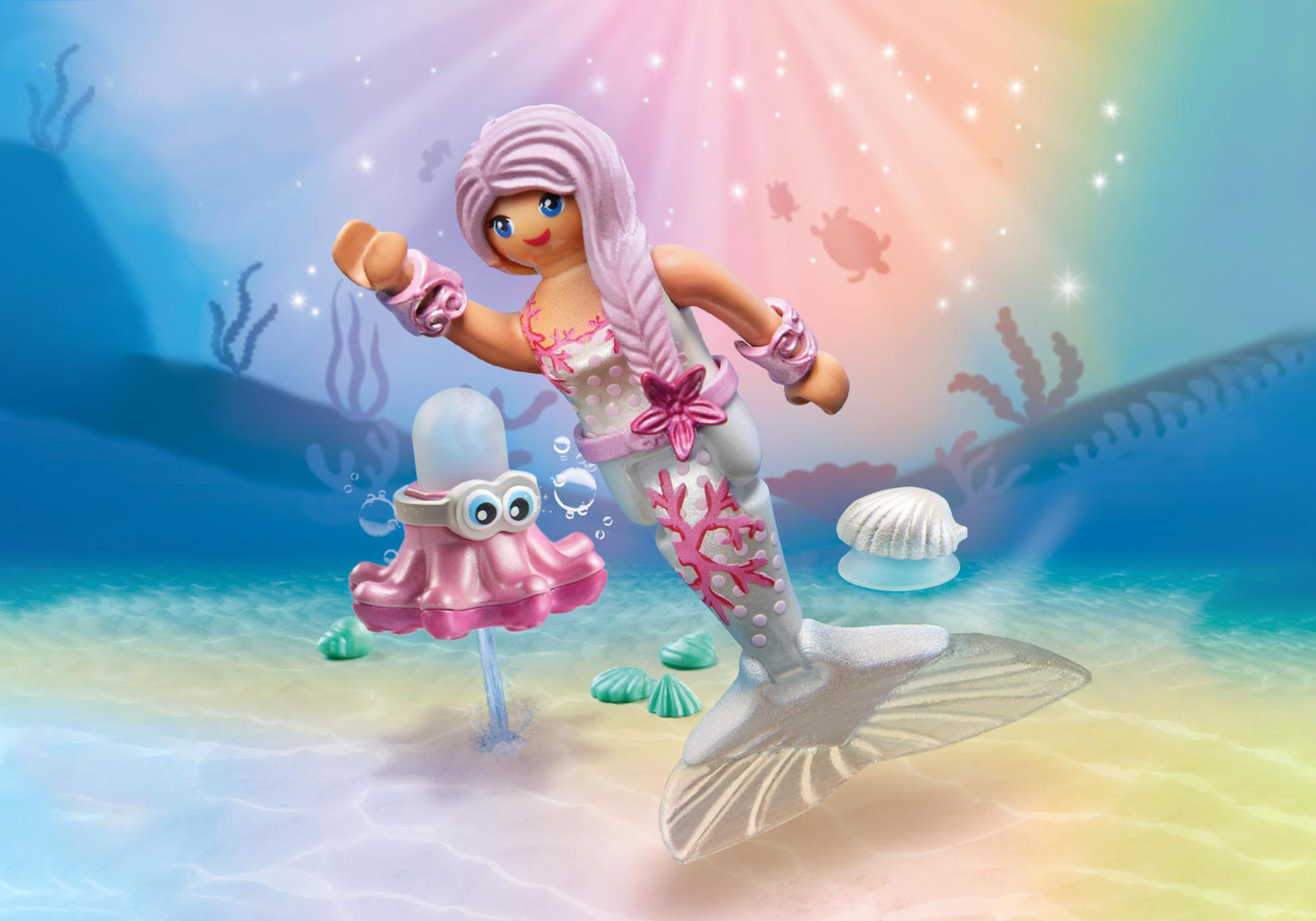Eine Meerjungfrau-Puppe schwimmt im Wasser mit Blasen und einer Muschel.
