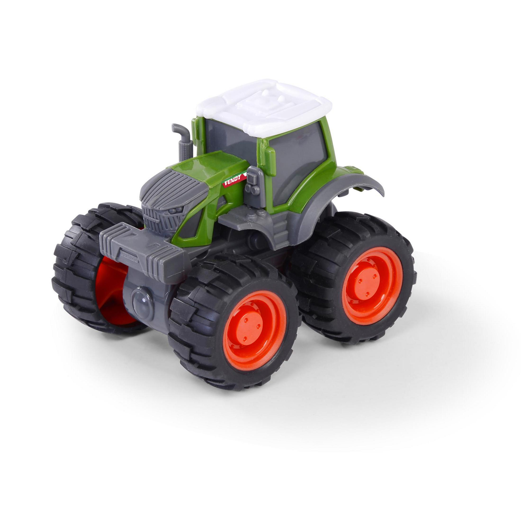 Ein grüner und grauer Fendt-Traktor. Er hat große schwarze Reifen mit orangefarbenen Felgen und ein weißes Dach.