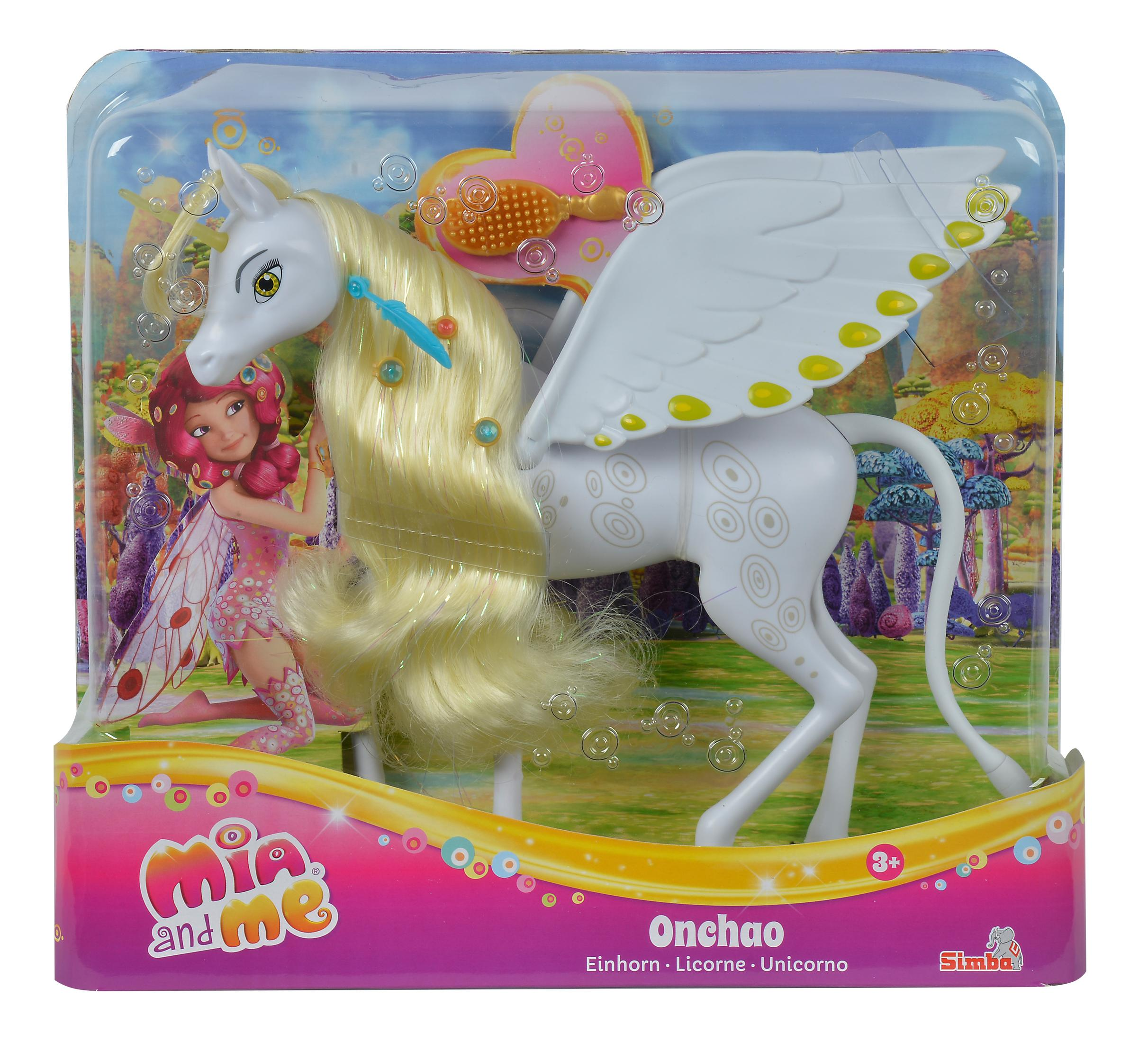 Ein Spielzeug-Einhorn in einer Verpackung, mit einer Feenfigur und anderem Zubehör.