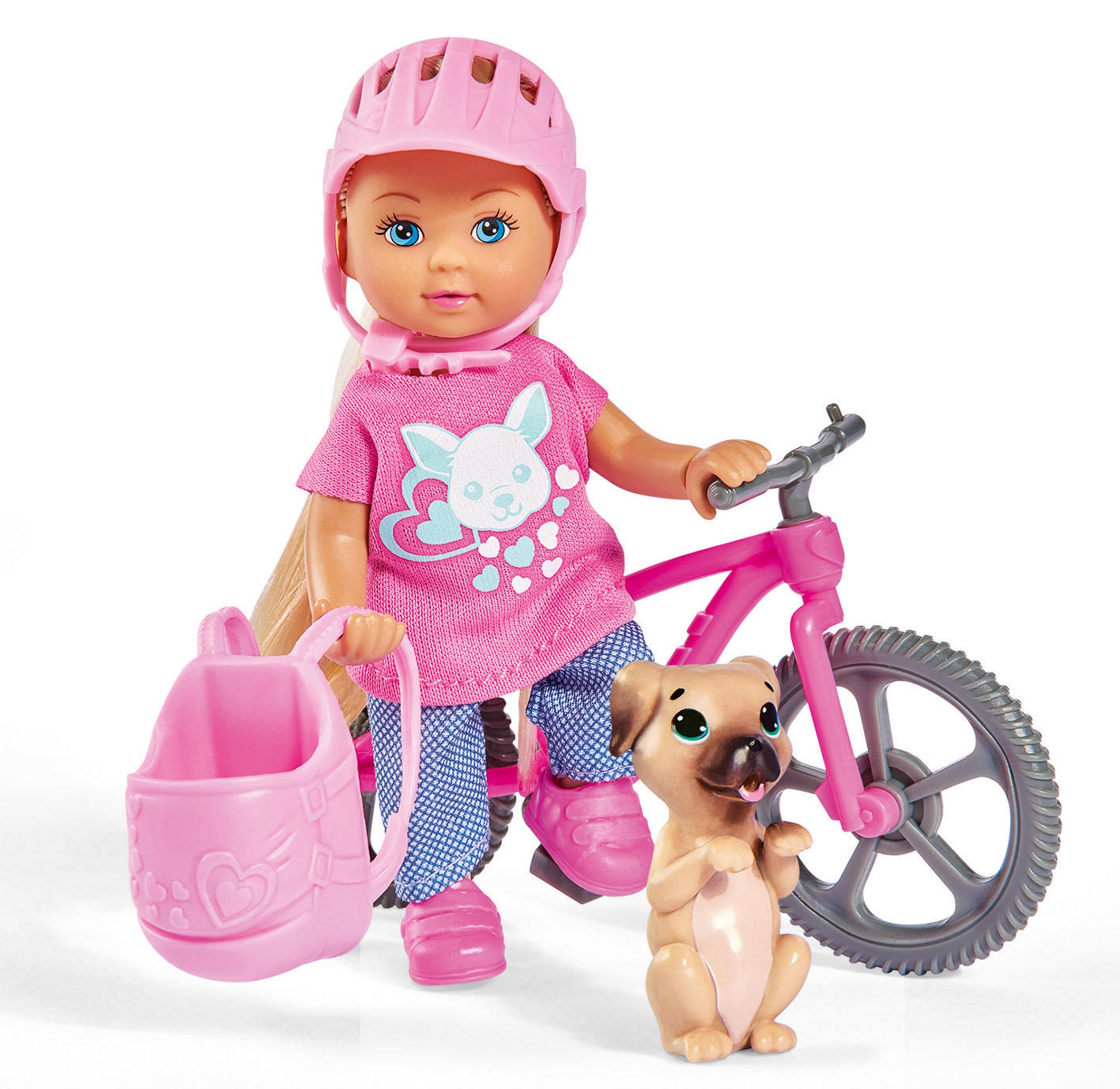 Eine Puppe mit pinkem Helm und Fahrrad. Ein Hund und Rucksack sind ebenfalls vorhanden.