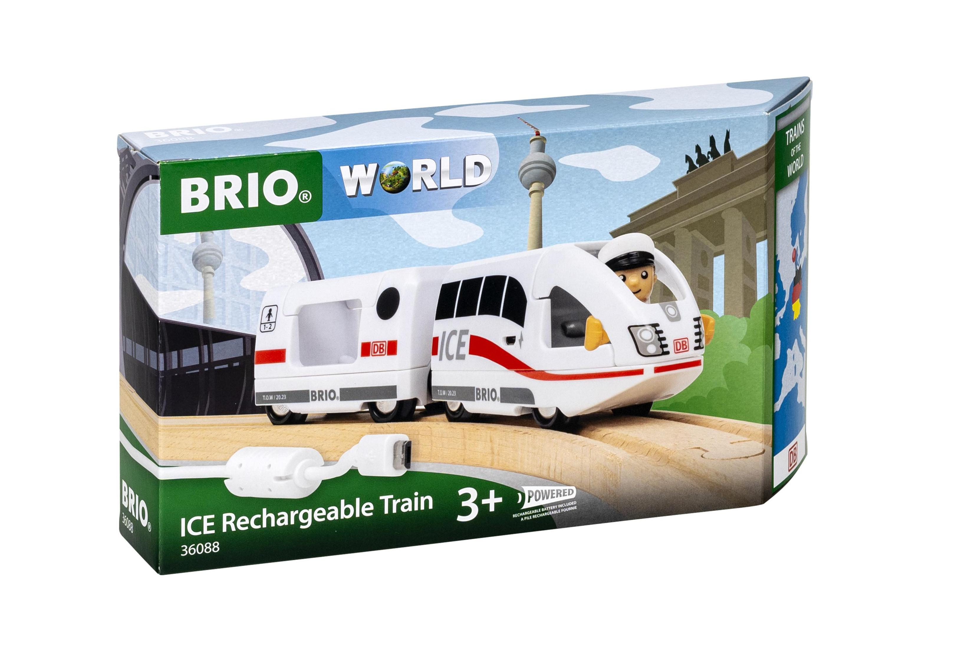 Un juego de trenes de juguete en una caja. El tren es blanco con detalles rojos y negros y la marca es BRIO World.