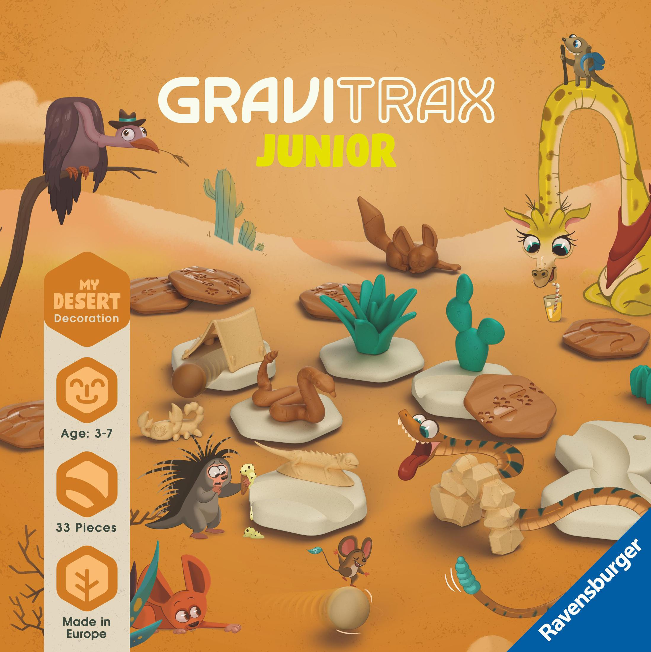 Pudełko Ravensburger GraviTrax Junior z różnymi elementami konstrukcyjnymi, motyw pustynny.