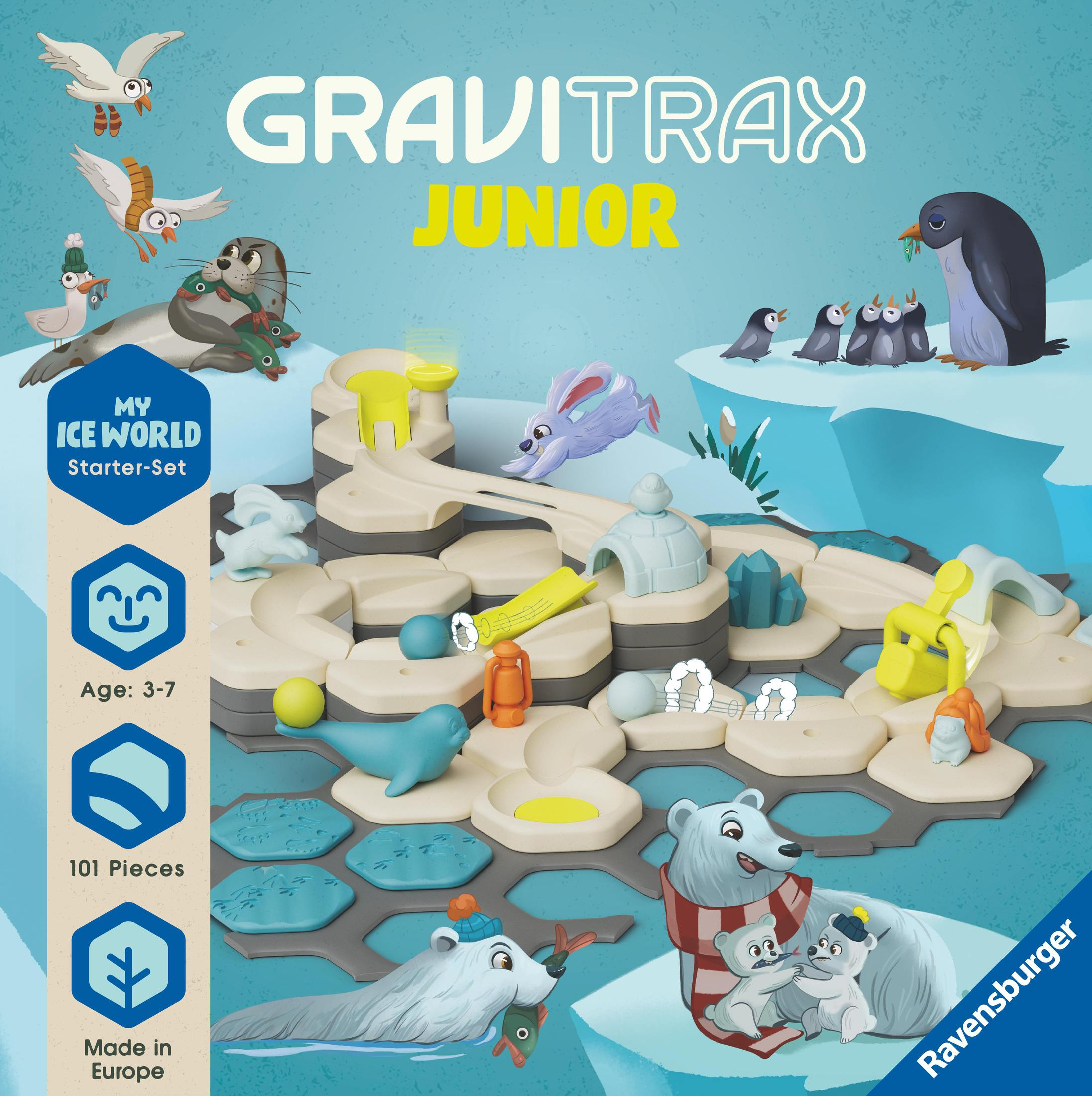 Scatola del gioco Gravitrax Junior. Una scatola di gioco da tavolo con pinguini, foche e un orso polare. La scatola mostra una scena invernale.