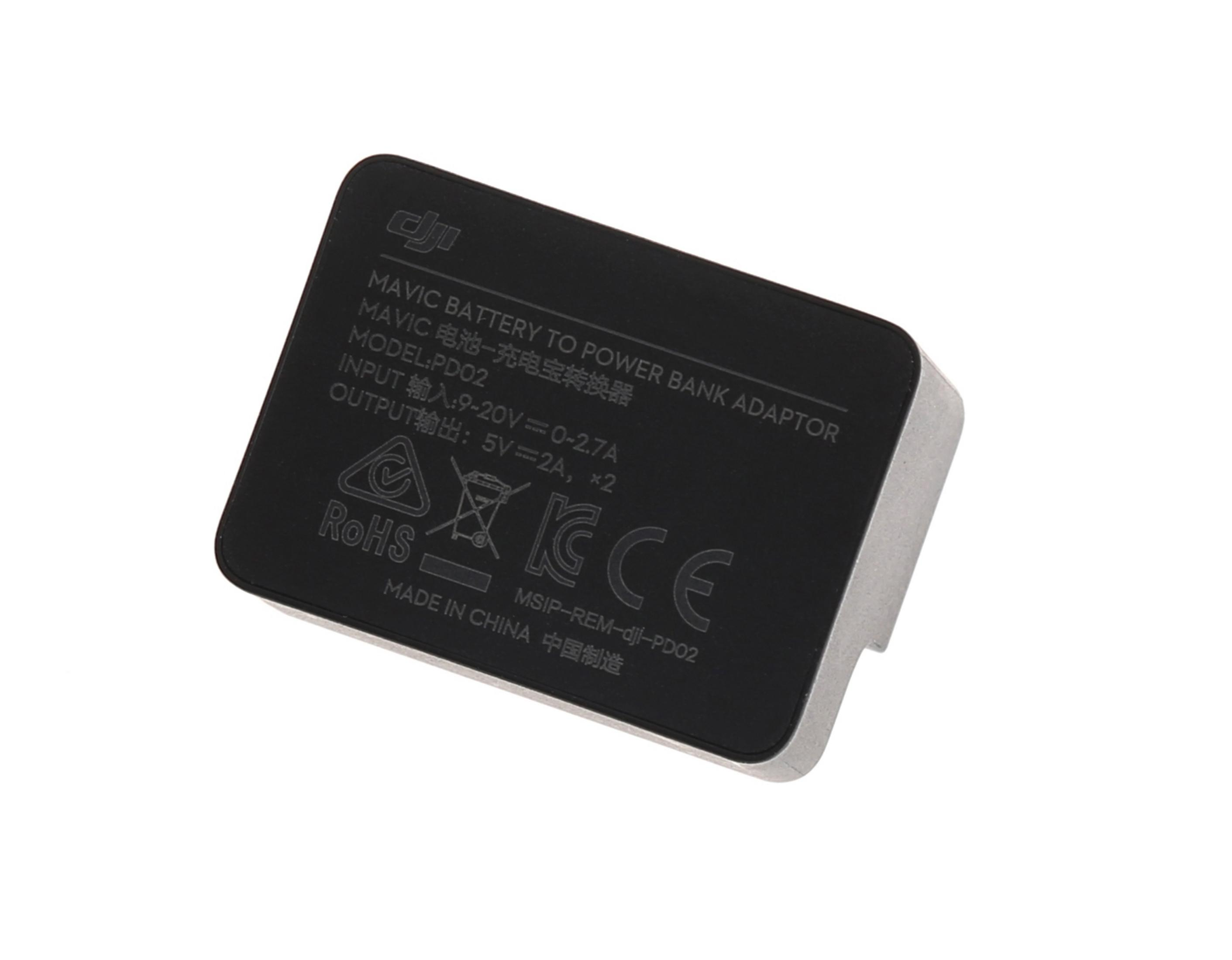 Adaptador DJI Mavic Battery to Power Bank negro con texto y símbolos sobre fondo blanco.