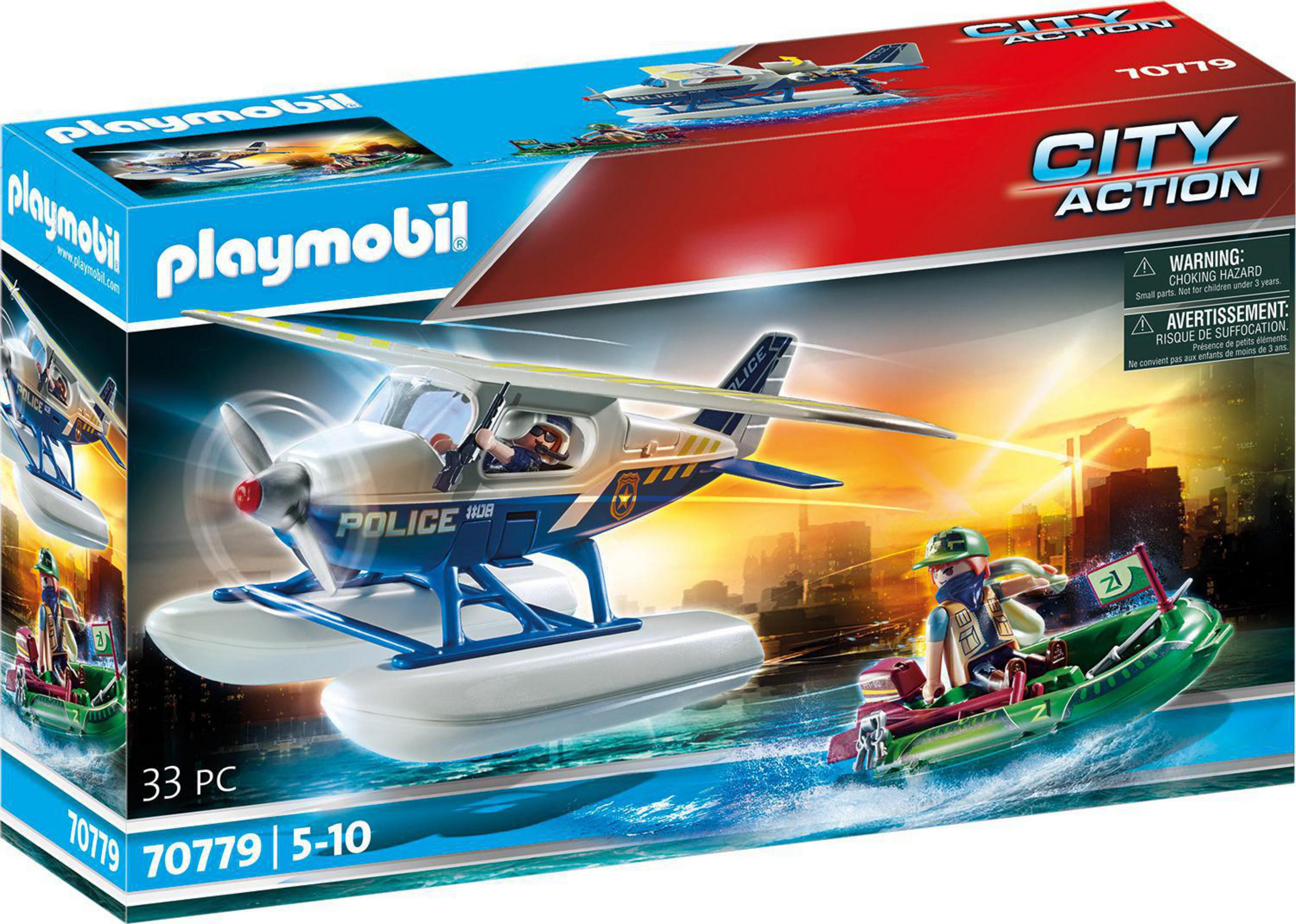 Eine Spielzeugbox zeigt ein Polizei-Wasserflugzeug mit Pilot und ein Boot mit einem Polizisten.