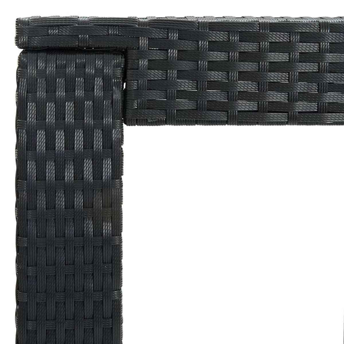 Un primo piano di un motivo nero intrecciato. È un angolo quadrato di un materiale simile al vimini.
