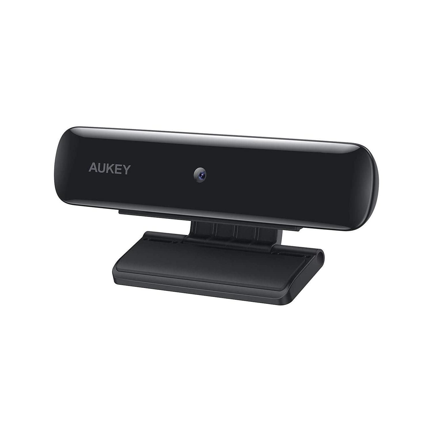 Eine schwarze Webcam mit elegantem Design. Das Gerät befindet sich auf weißem Hintergrund und trägt den Namen AUKEY.