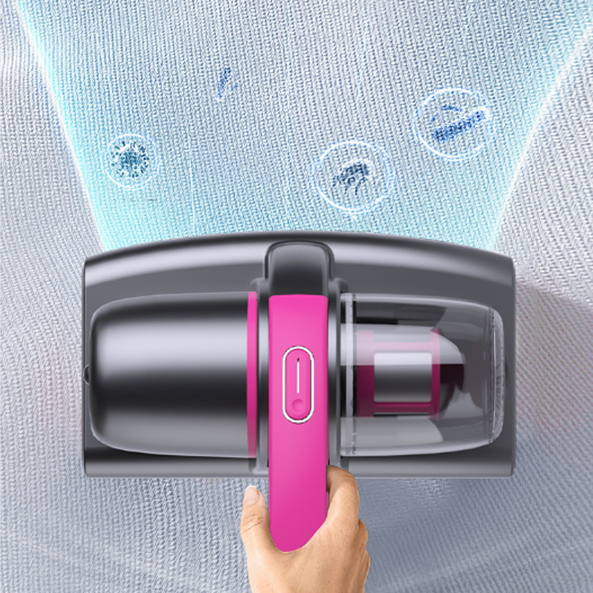 Ein Handstaubsauger mit rosa Griff, der ein Tuch reinigt. Blasen steigen aus dem Tuch auf.