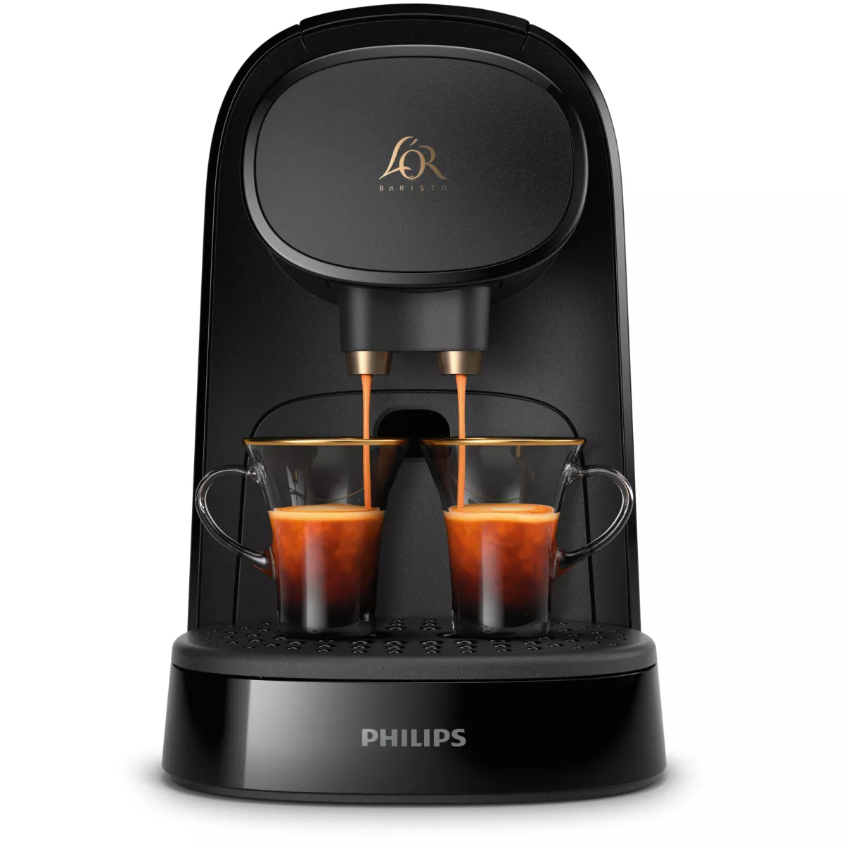 Cafetera negra con dos tazas llenándose de café expreso y detalles dorados.