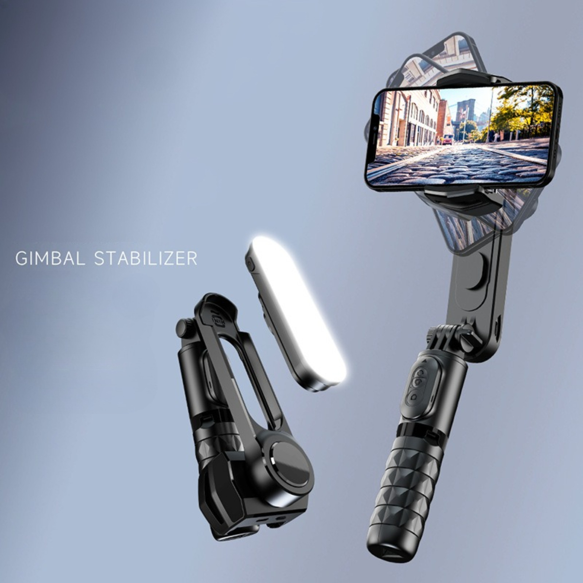 Gimbal-Stabilisator mit Licht und Telefon befestigt. Schwarzes und silbernes Design. Grauer Hintergrund.