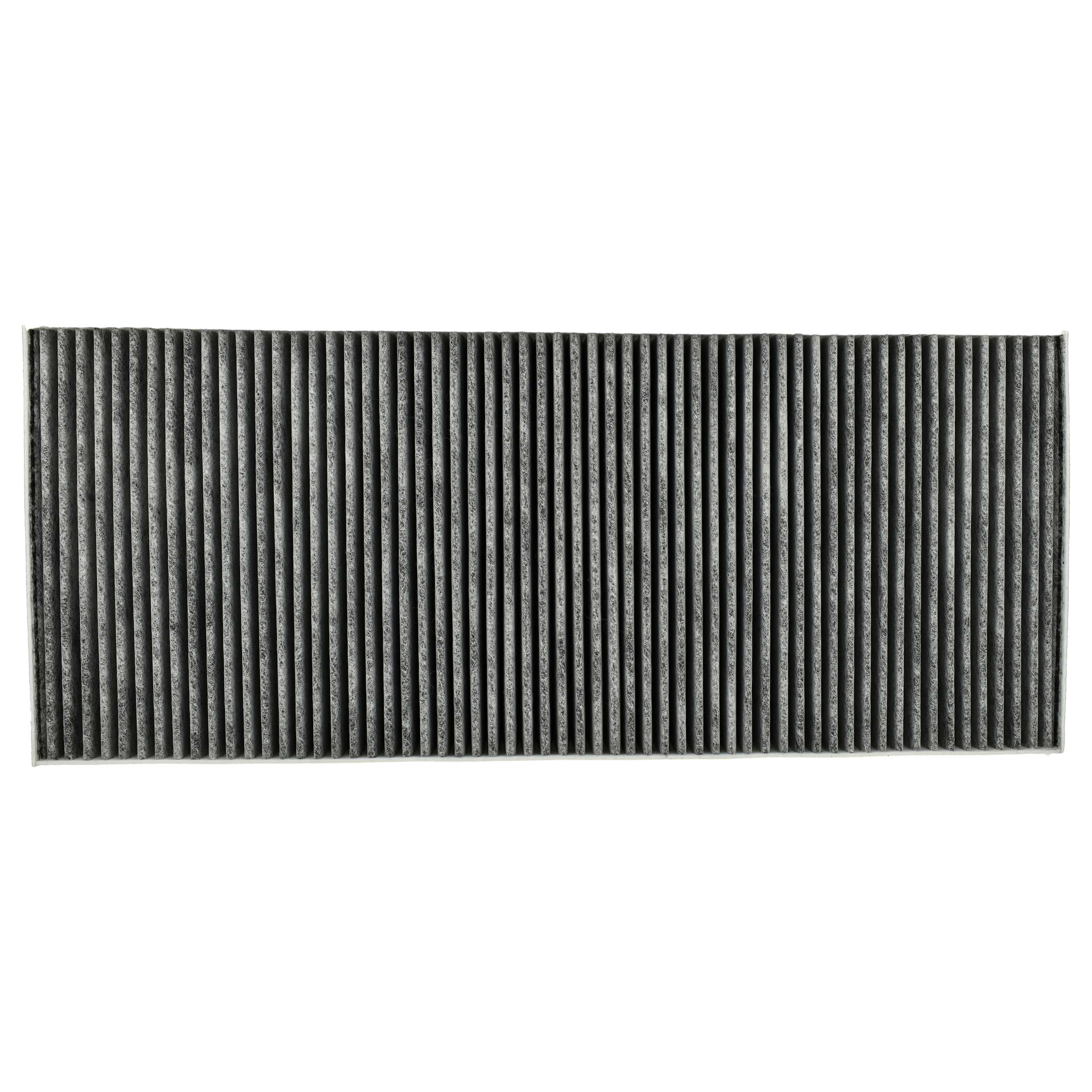 Ein schwarzer rechteckiger Luftfilter mit vertikalen, grau gefalteten Rippen.