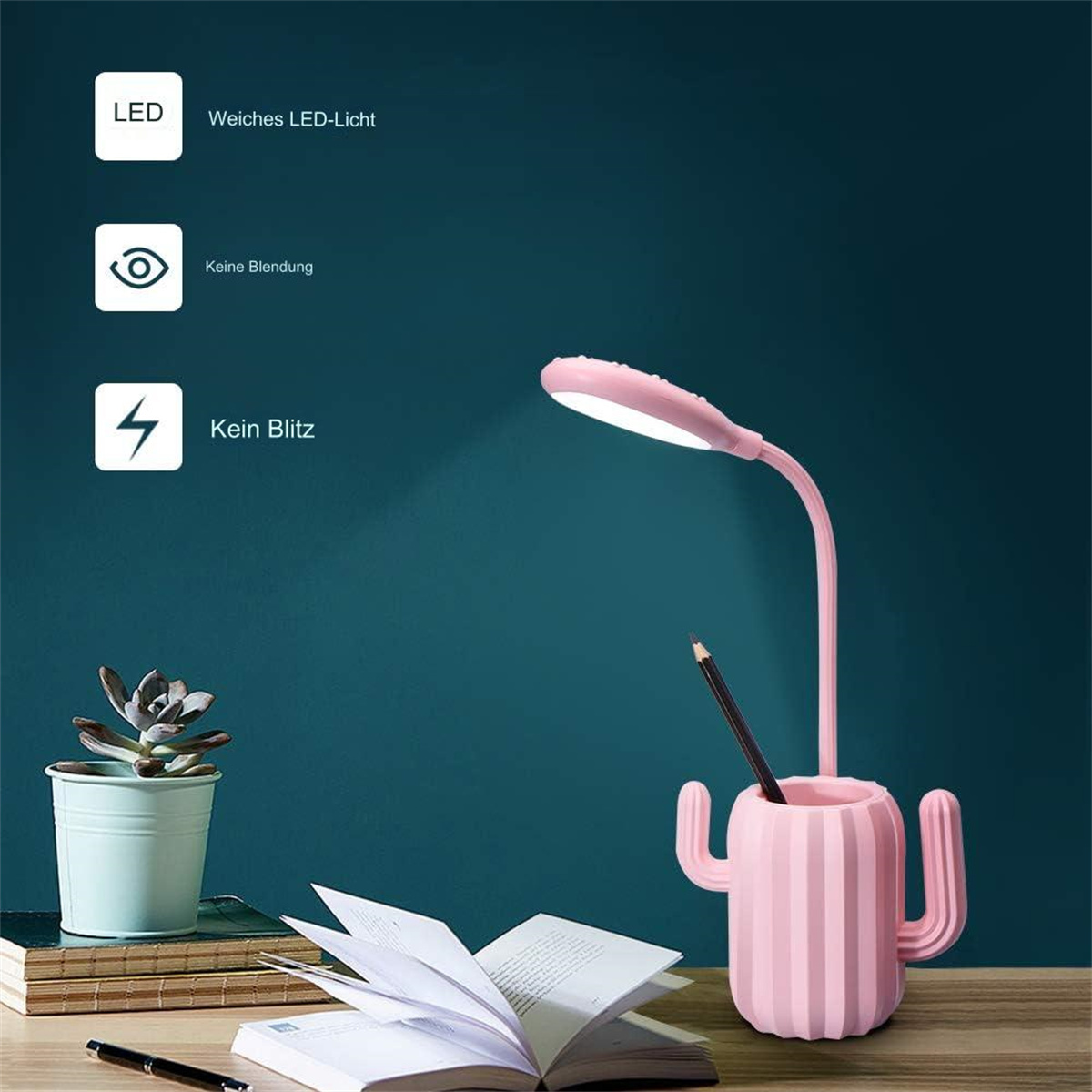 Eine rosa Kaktus-Schreibtischlampe mit Stifthalter und ein Buch auf einem Schreibtisch.