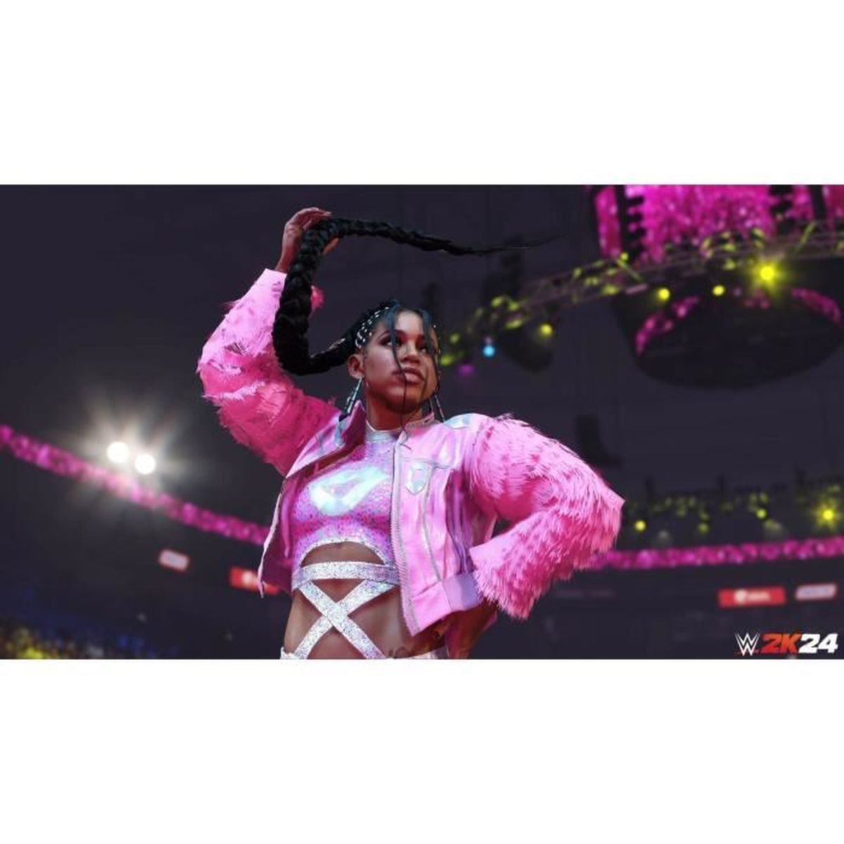 Una donna in abito da wrestling rosa alza le sue trecce in un ring. Il logo "WWE 2K24" è visibile.